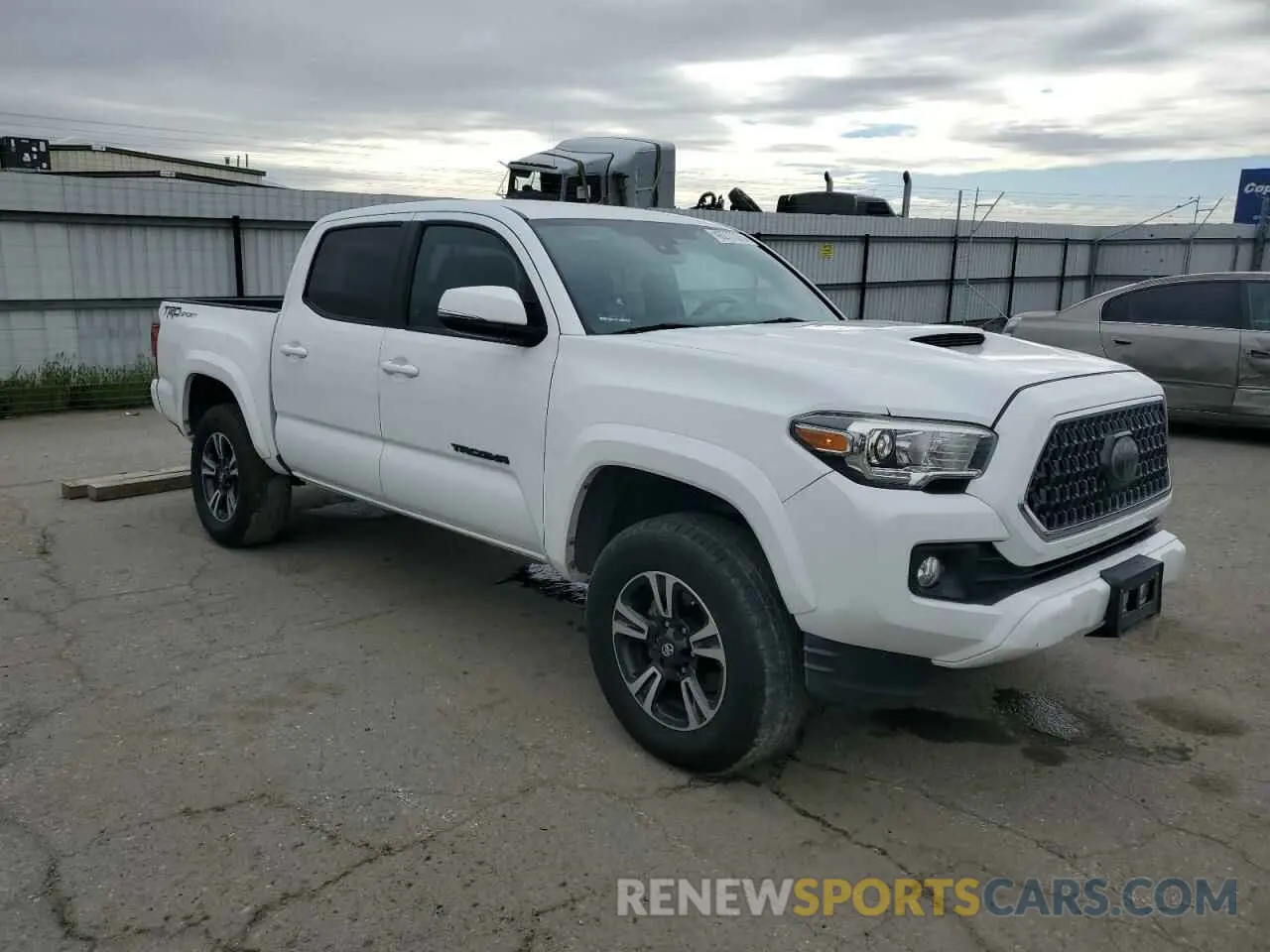 4 Photograph of a damaged car 3TMAZ5CN6KM090124 TOYOTA TACOMA 2019