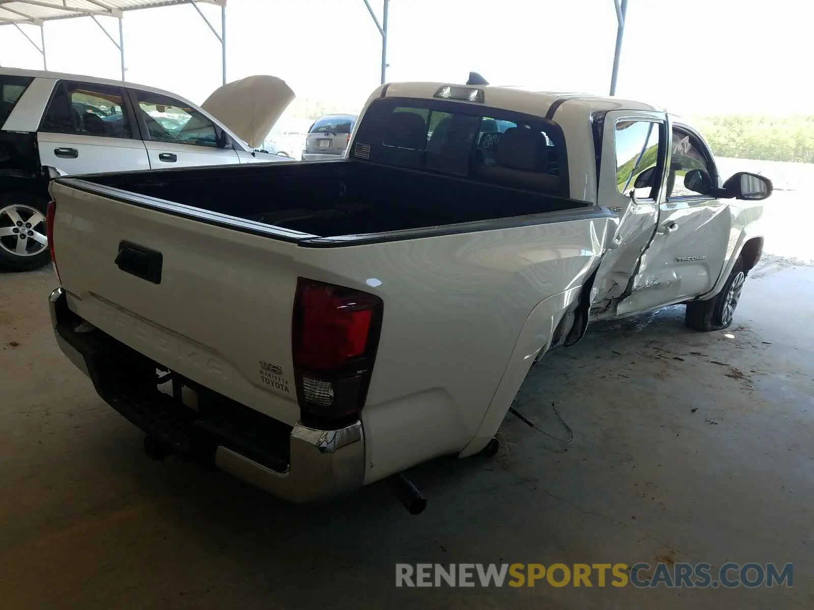 4 Photograph of a damaged car 3TMAZ5CN6KM111375 TOYOTA TACOMA 2019
