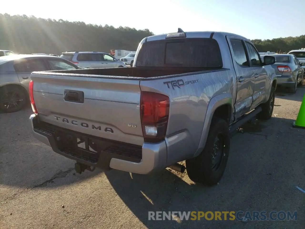 4 Photograph of a damaged car 3TMAZ5CN6KM113661 TOYOTA TACOMA 2019