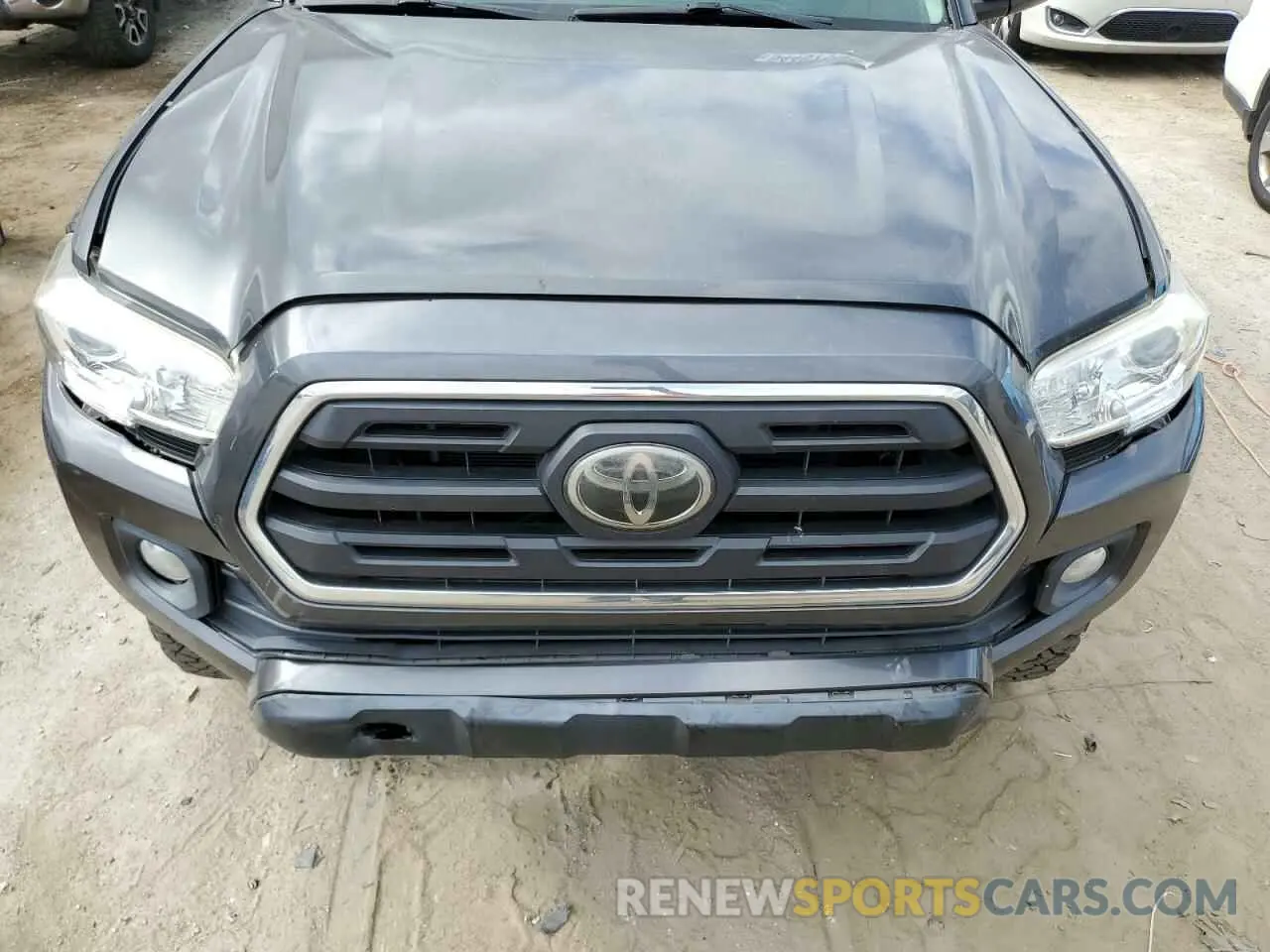 11 Photograph of a damaged car 3TMAZ5CN7KM082324 TOYOTA TACOMA 2019