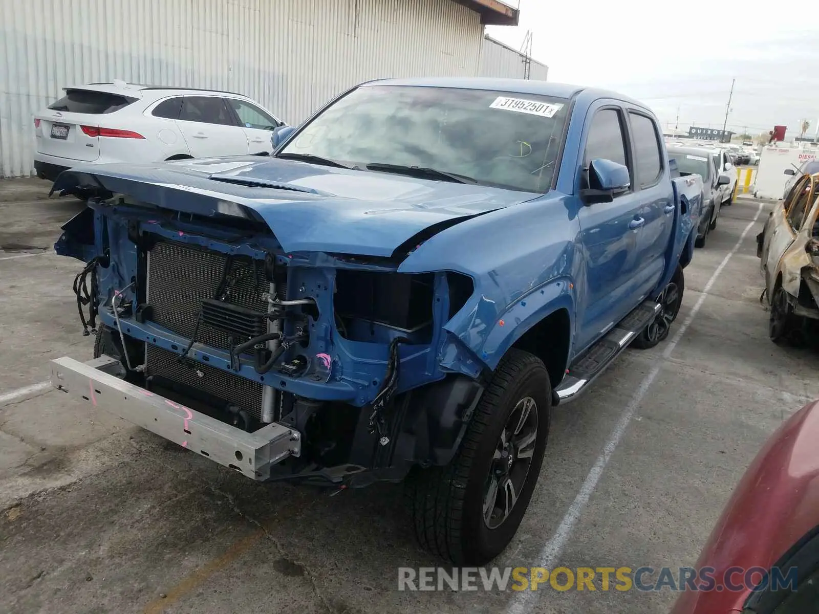 2 Photograph of a damaged car 3TMAZ5CN7KM096854 TOYOTA TACOMA 2019