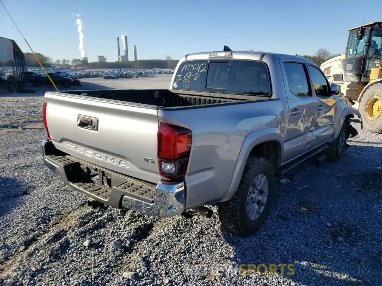 4 Photograph of a damaged car 3TMAZ5CN7KM103012 TOYOTA TACOMA 2019