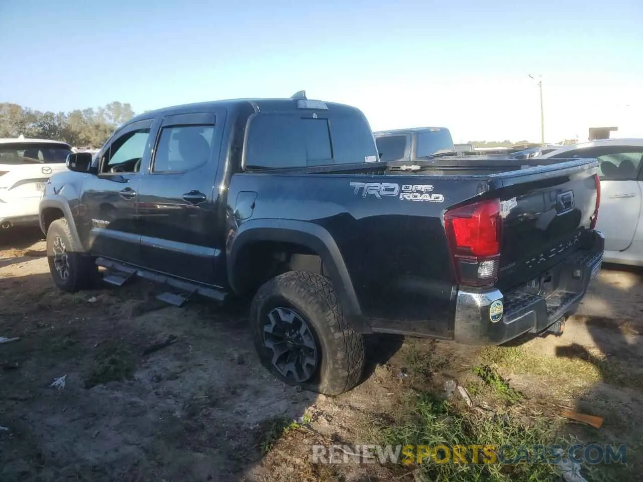 2 Photograph of a damaged car 3TMAZ5CN8KM083661 TOYOTA TACOMA 2019