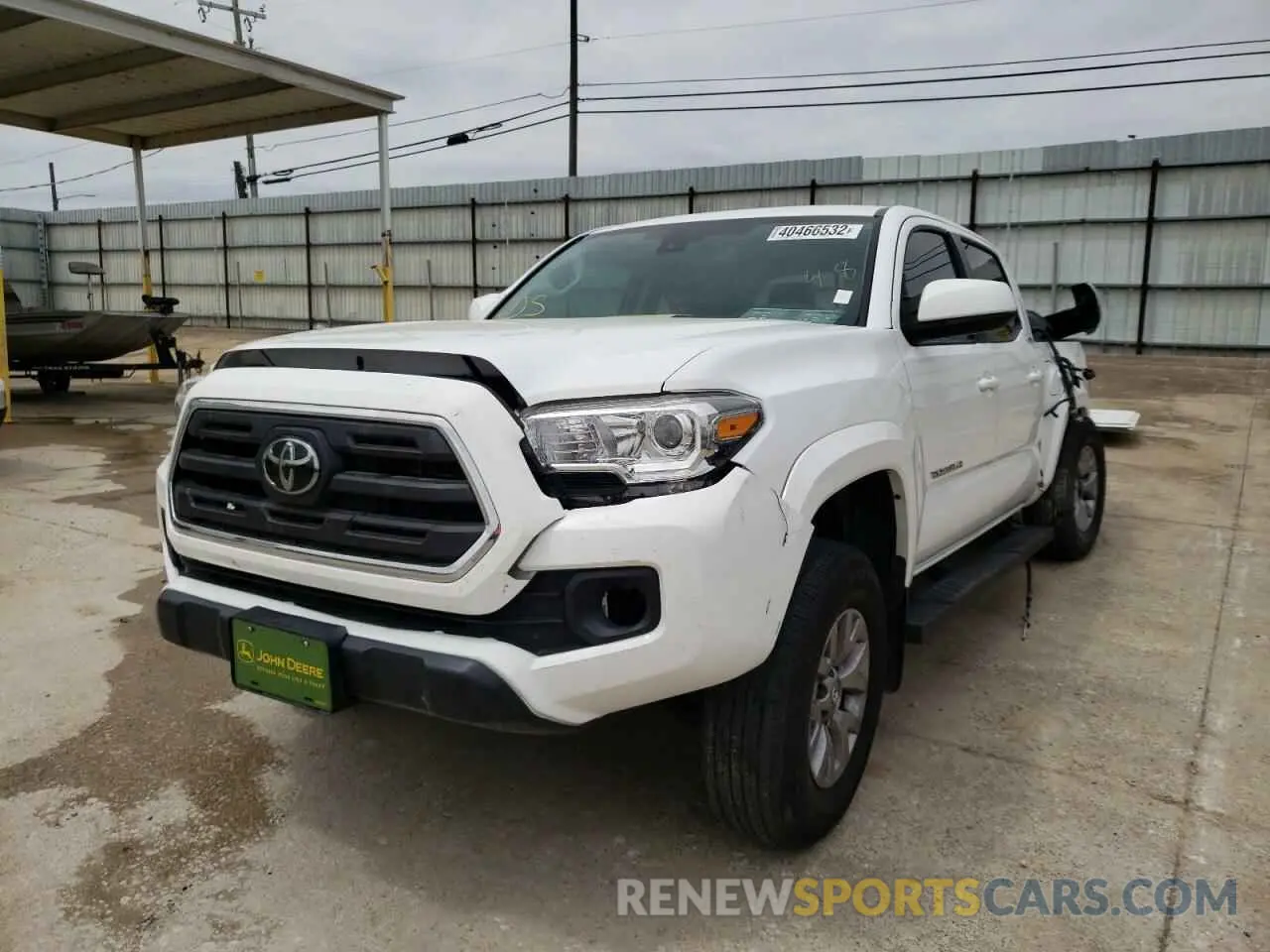 2 Photograph of a damaged car 3TMAZ5CN9KM083703 TOYOTA TACOMA 2019