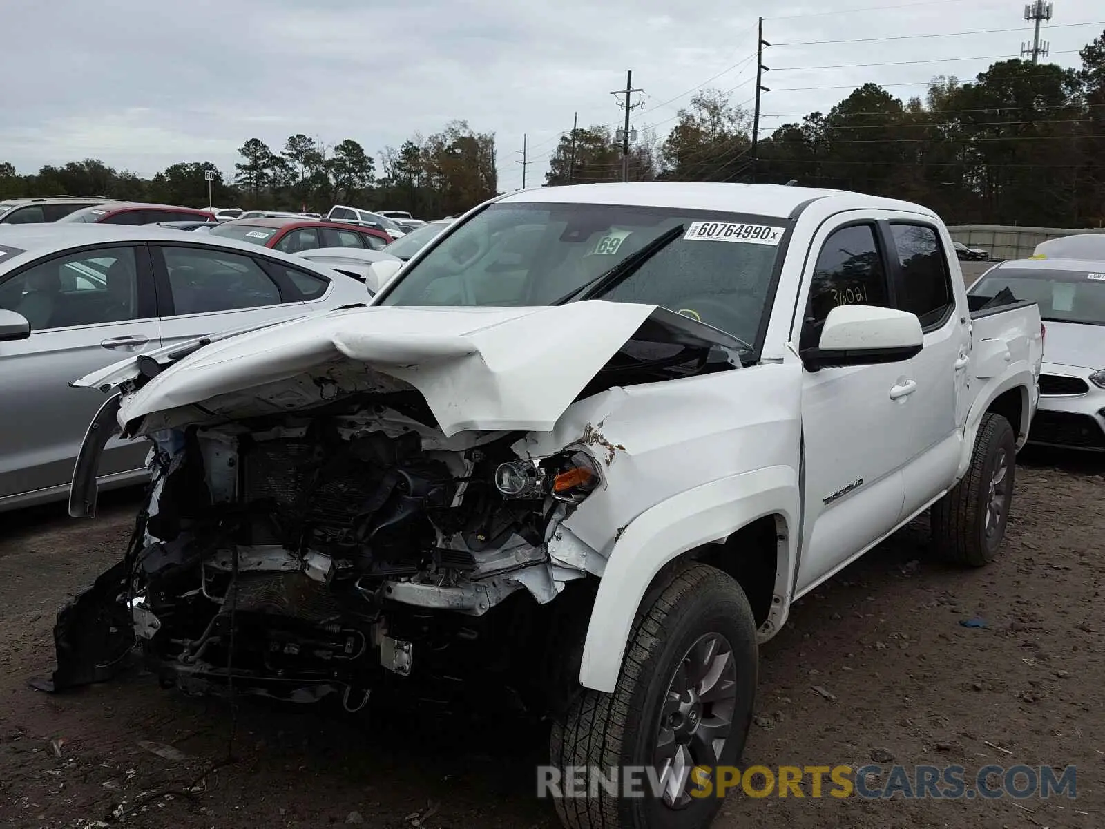 2 Photograph of a damaged car 3TMAZ5CN9KM089193 TOYOTA TACOMA 2019