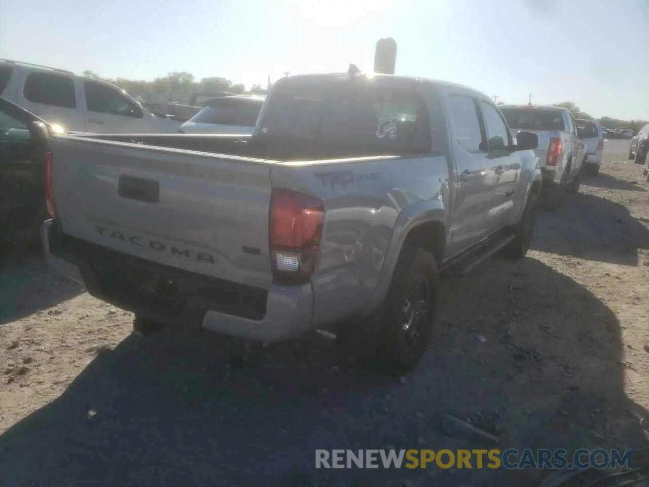 4 Photograph of a damaged car 3TMAZ5CNXKM106549 TOYOTA TACOMA 2019