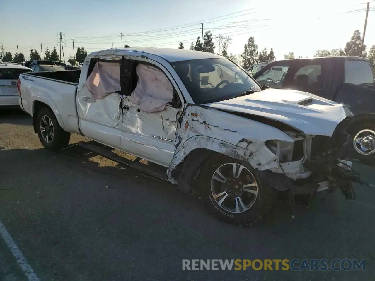 4 Photograph of a damaged car 3TMBZ5DN0KM018287 TOYOTA TACOMA 2019