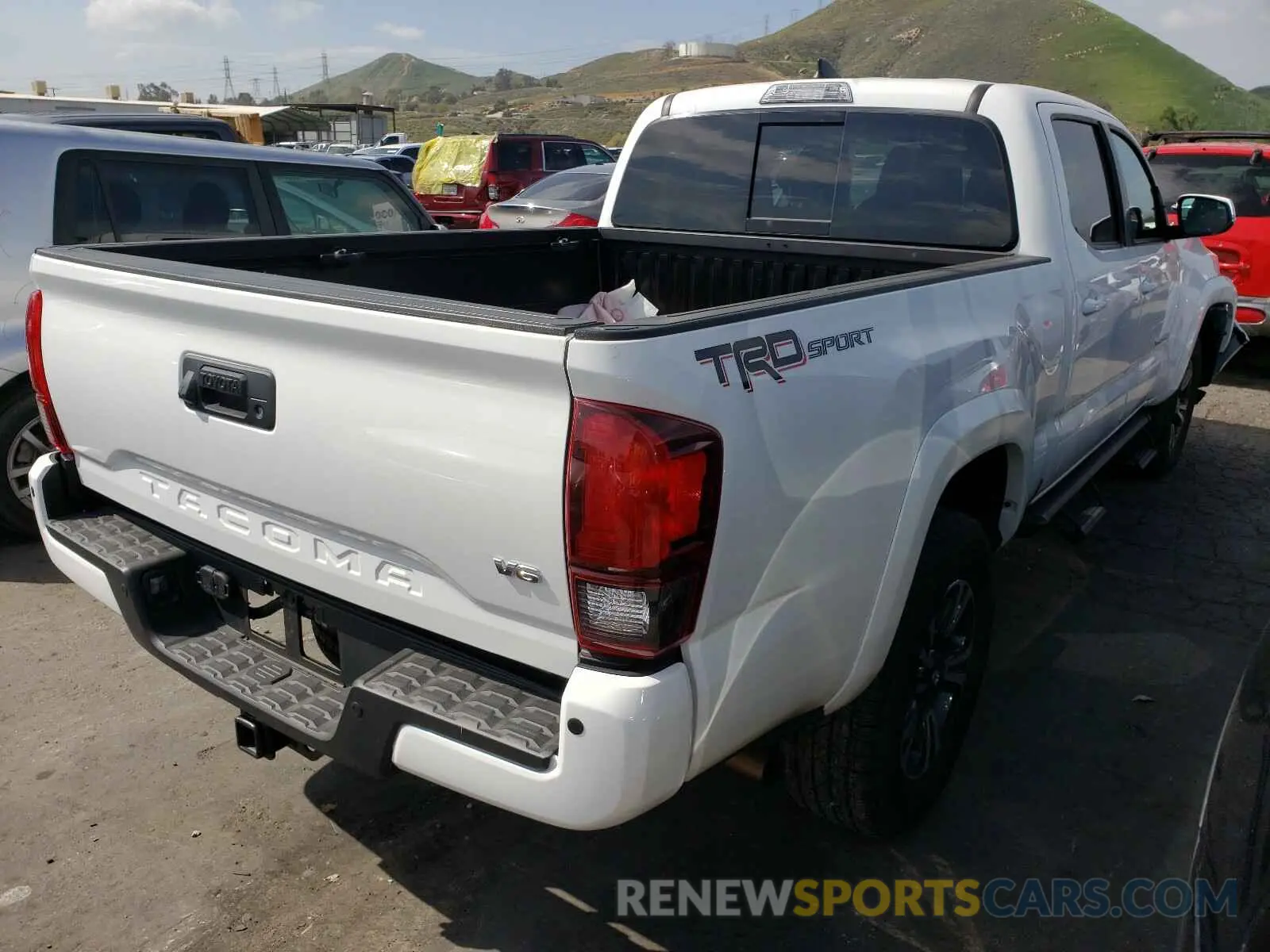 4 Photograph of a damaged car 3TMBZ5DN0KM022131 TOYOTA TACOMA 2019