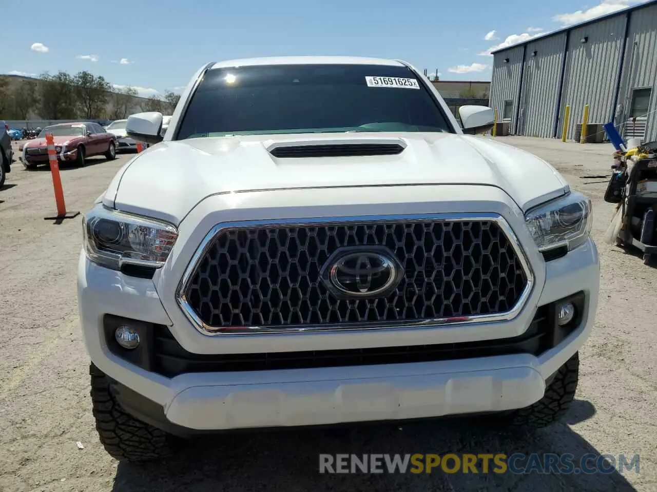 5 Photograph of a damaged car 3TMBZ5DN8KM023009 TOYOTA TACOMA 2019
