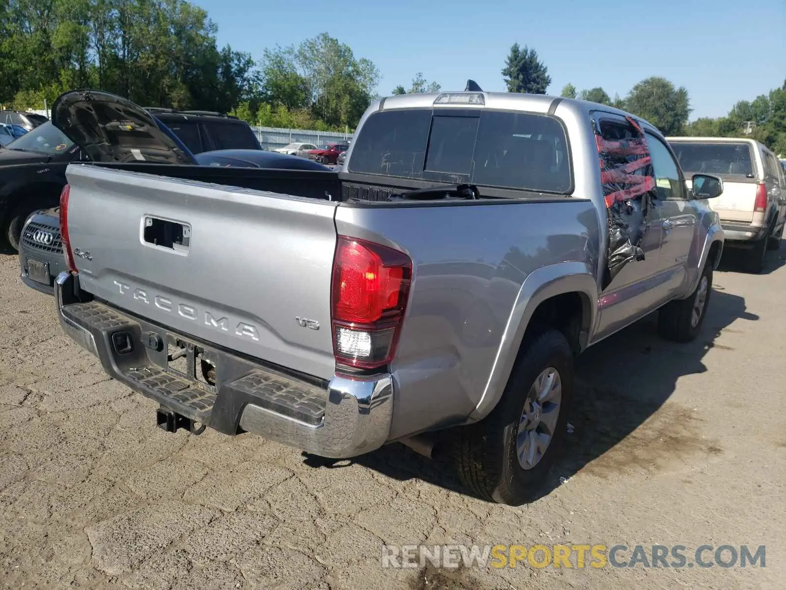 4 Photograph of a damaged car 3TMCZ5AN0KM223830 TOYOTA TACOMA 2019