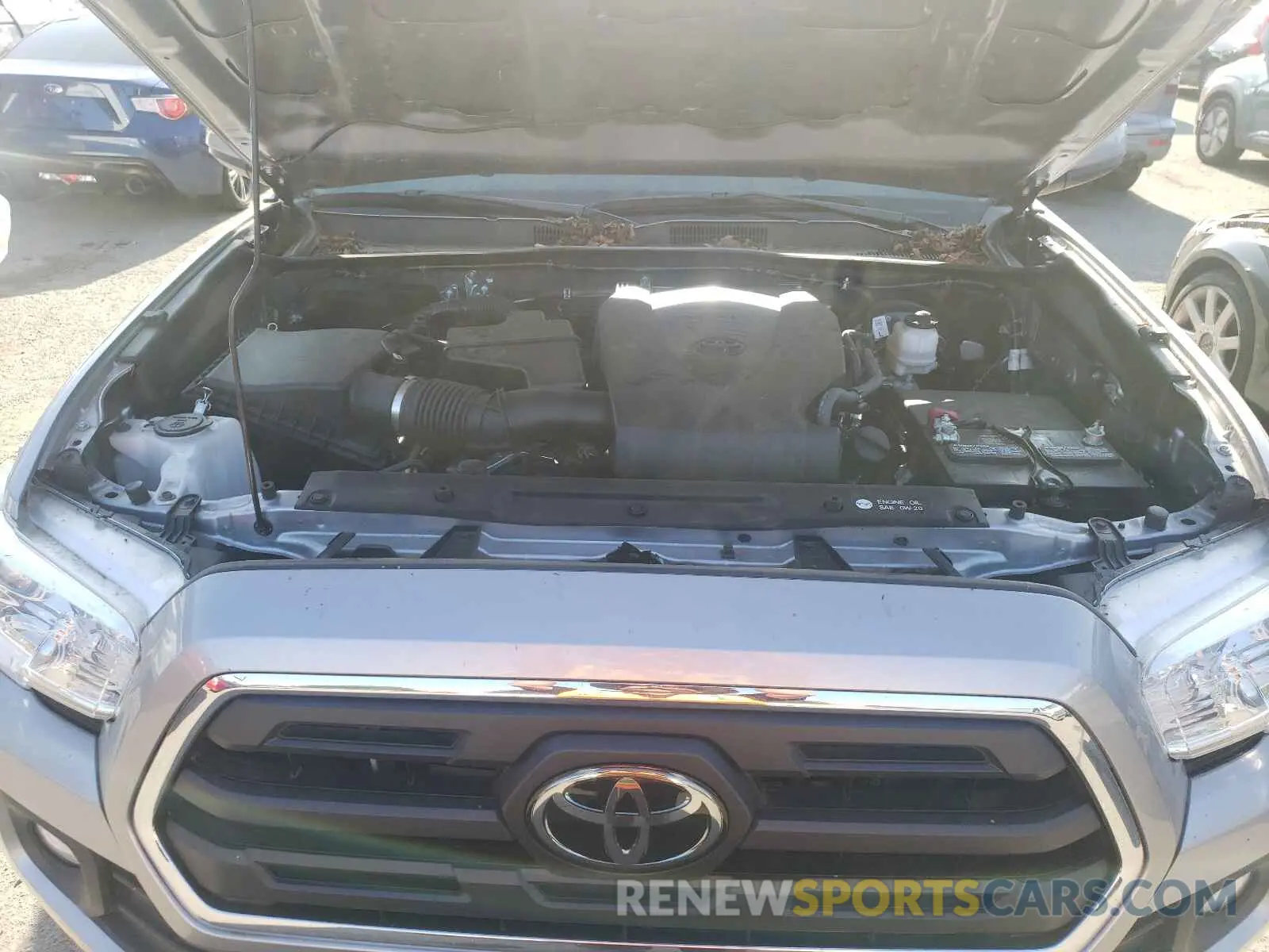 7 Photograph of a damaged car 3TMCZ5AN0KM223830 TOYOTA TACOMA 2019