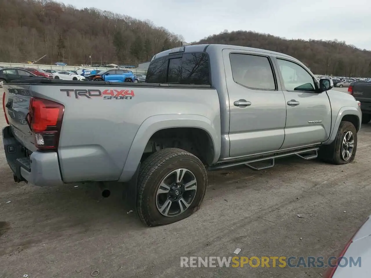 3 Photograph of a damaged car 3TMCZ5AN0KM255984 TOYOTA TACOMA 2019