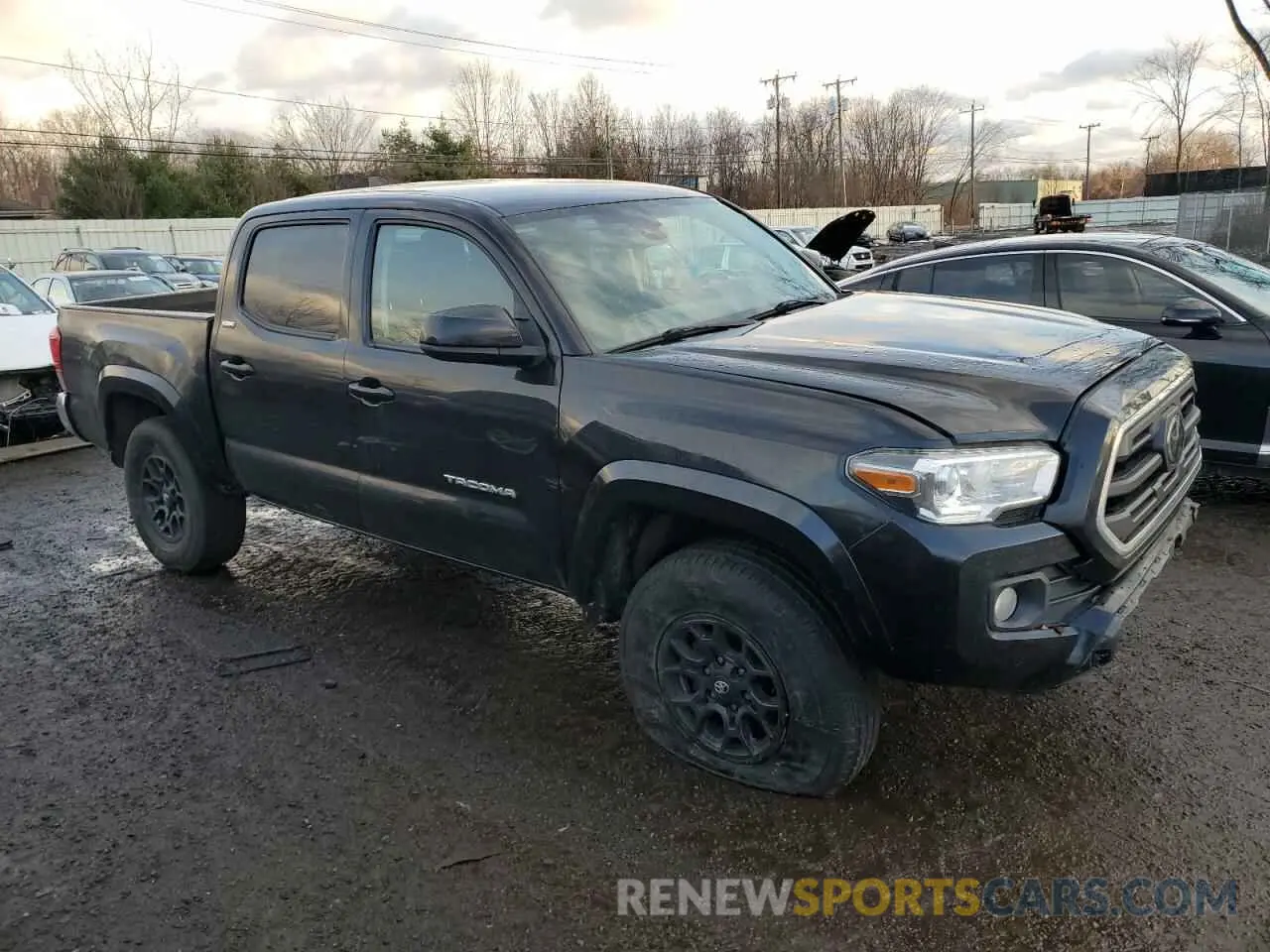 4 Photograph of a damaged car 3TMCZ5AN0KM271389 TOYOTA TACOMA 2019