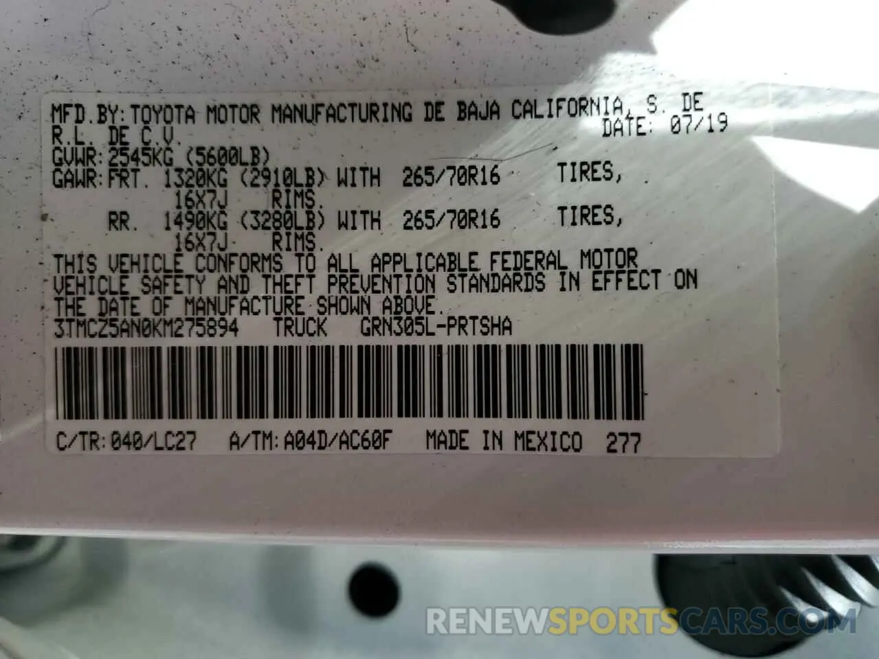 12 Photograph of a damaged car 3TMCZ5AN0KM275894 TOYOTA TACOMA 2019