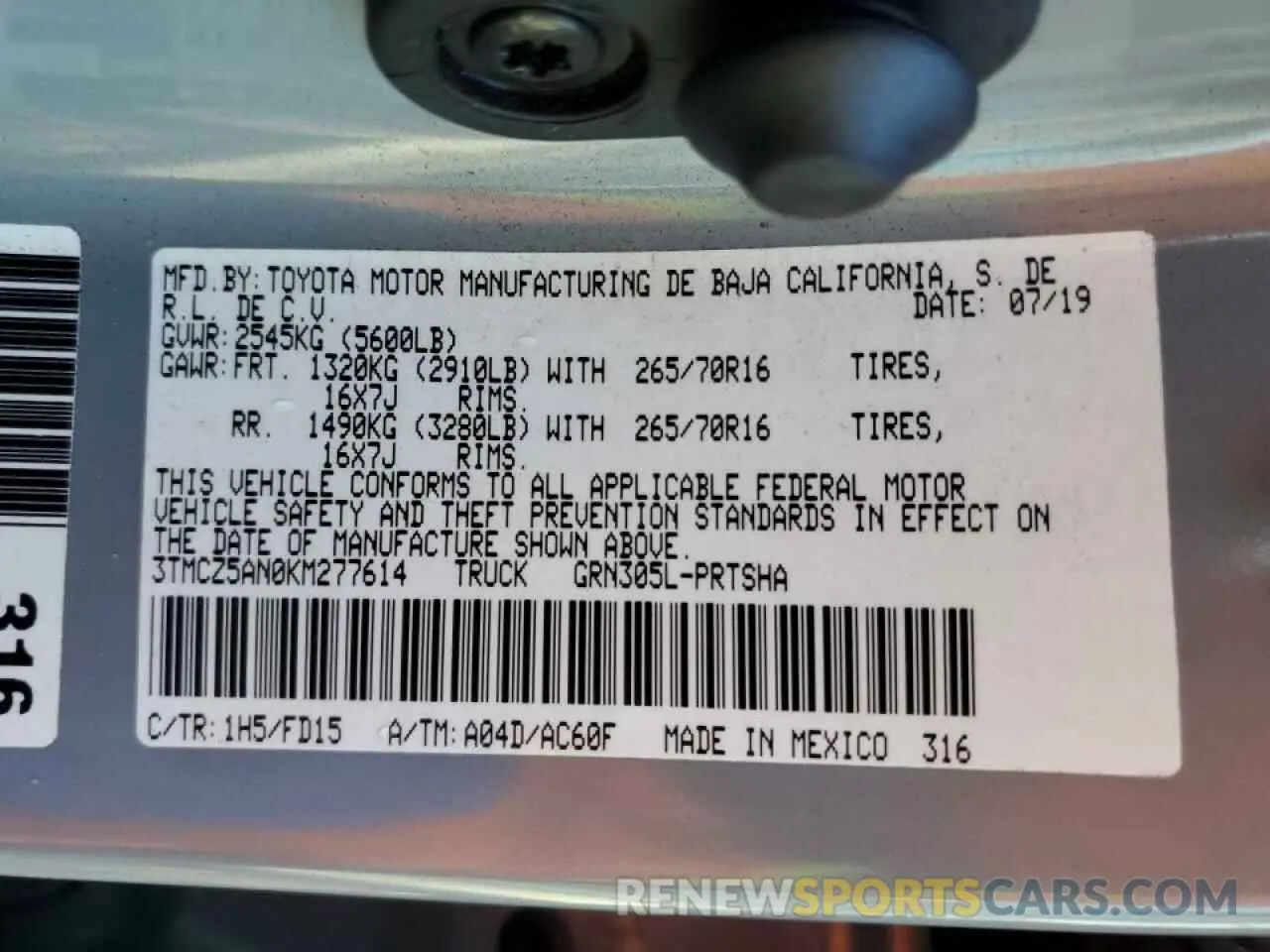 13 Photograph of a damaged car 3TMCZ5AN0KM277614 TOYOTA TACOMA 2019