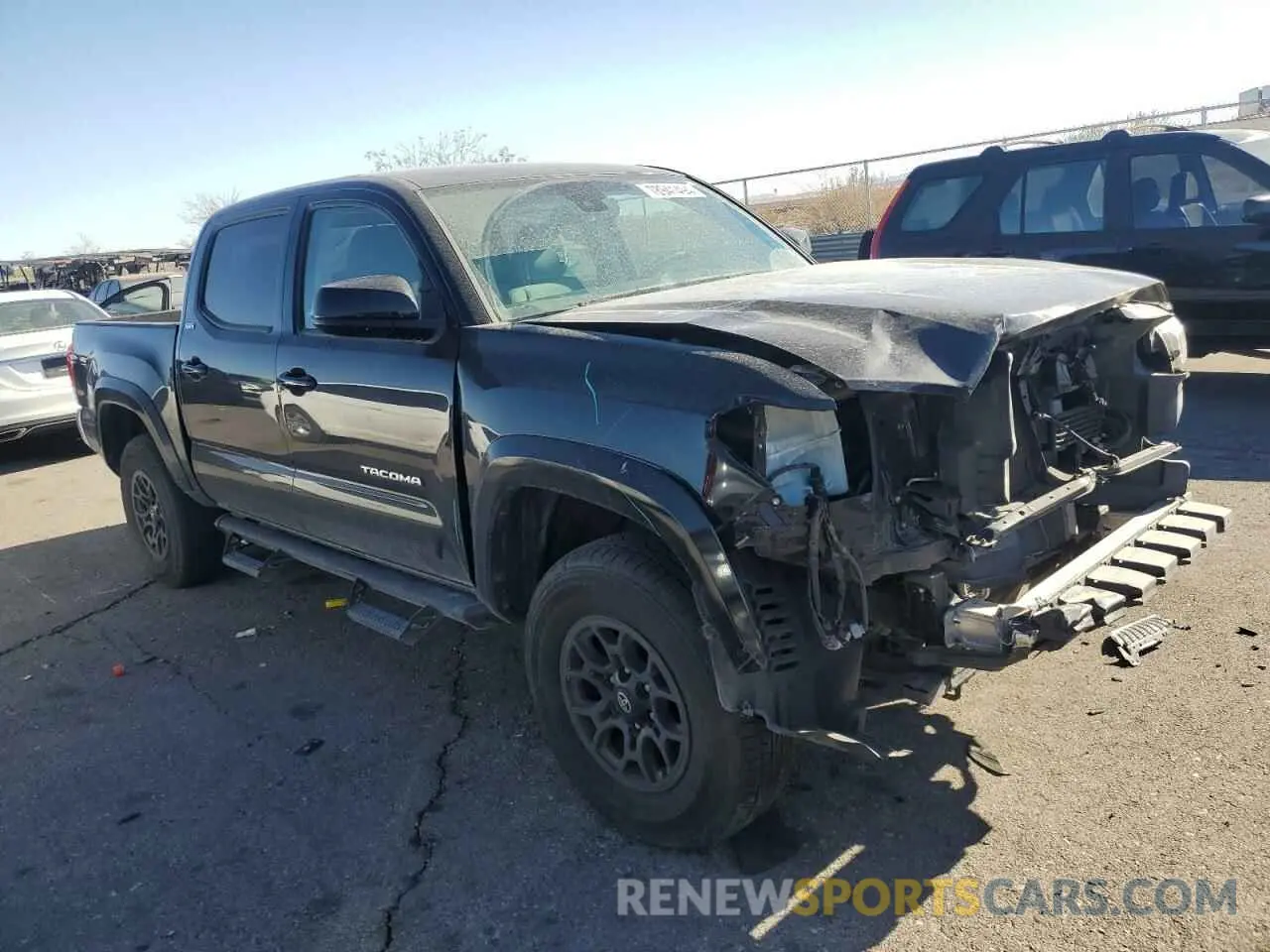 4 Photograph of a damaged car 3TMCZ5AN1KM210441 TOYOTA TACOMA 2019