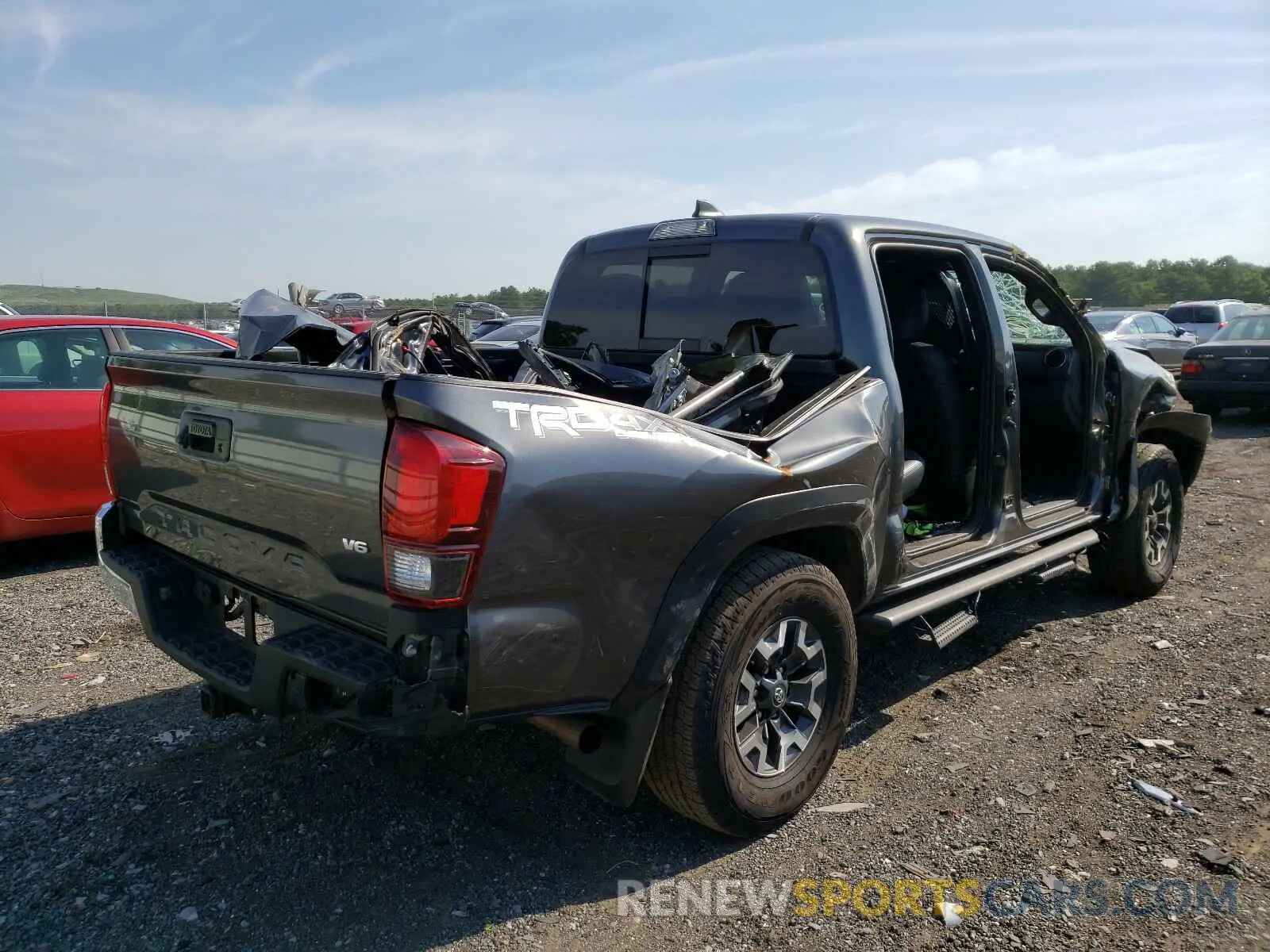 4 Photograph of a damaged car 3TMCZ5AN1KM228518 TOYOTA TACOMA 2019