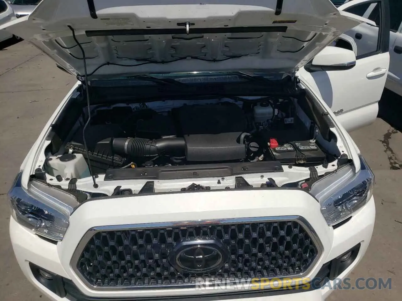 7 Photograph of a damaged car 3TMCZ5AN1KM265777 TOYOTA TACOMA 2019