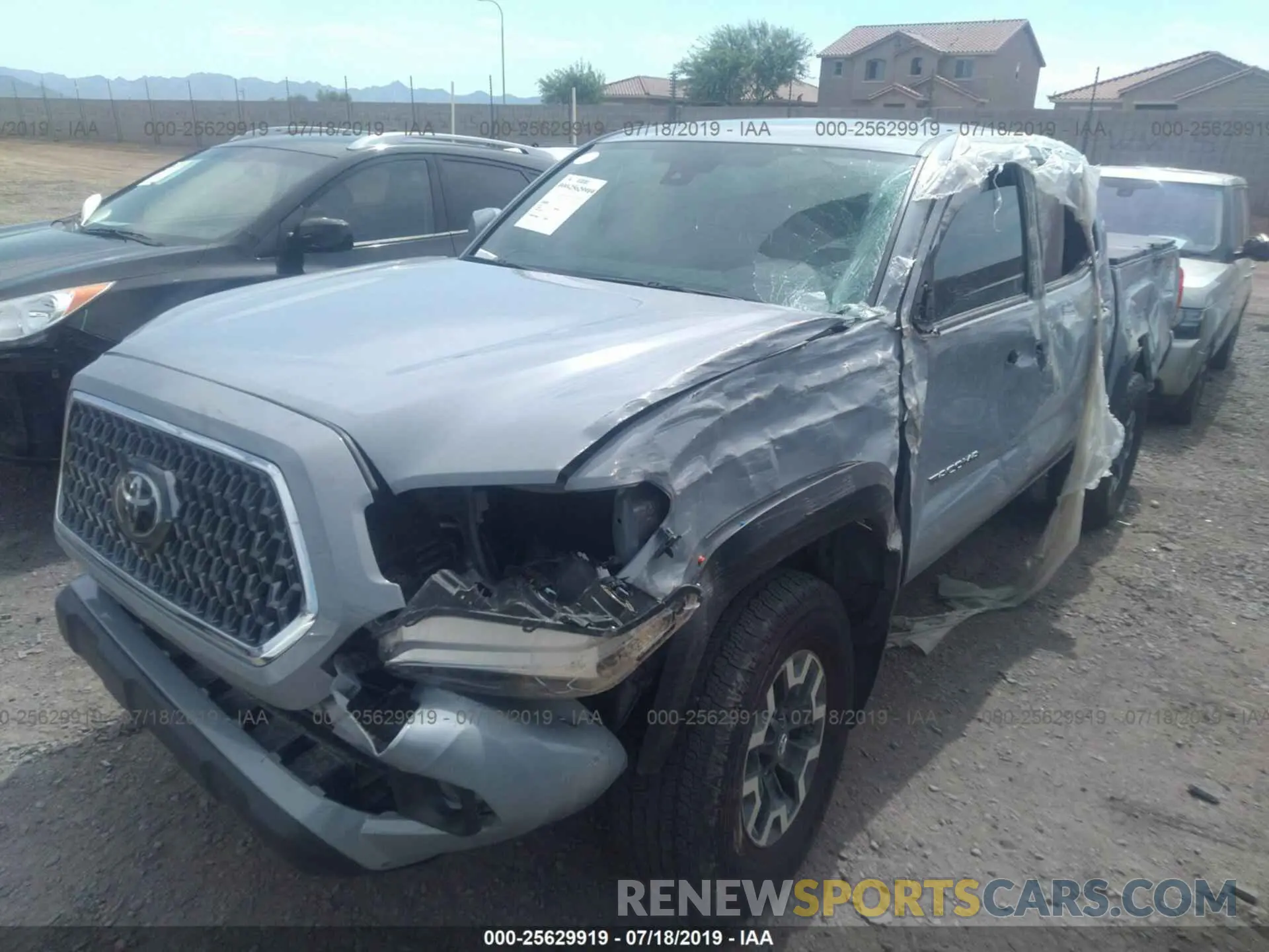 2 Photograph of a damaged car 3TMCZ5AN2KM208939 TOYOTA TACOMA 2019