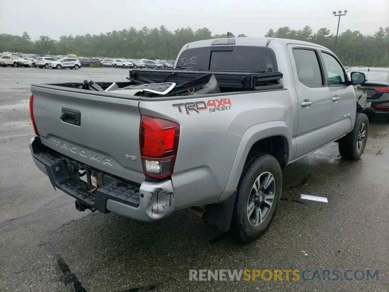 4 Photograph of a damaged car 3TMCZ5AN2KM224896 TOYOTA TACOMA 2019