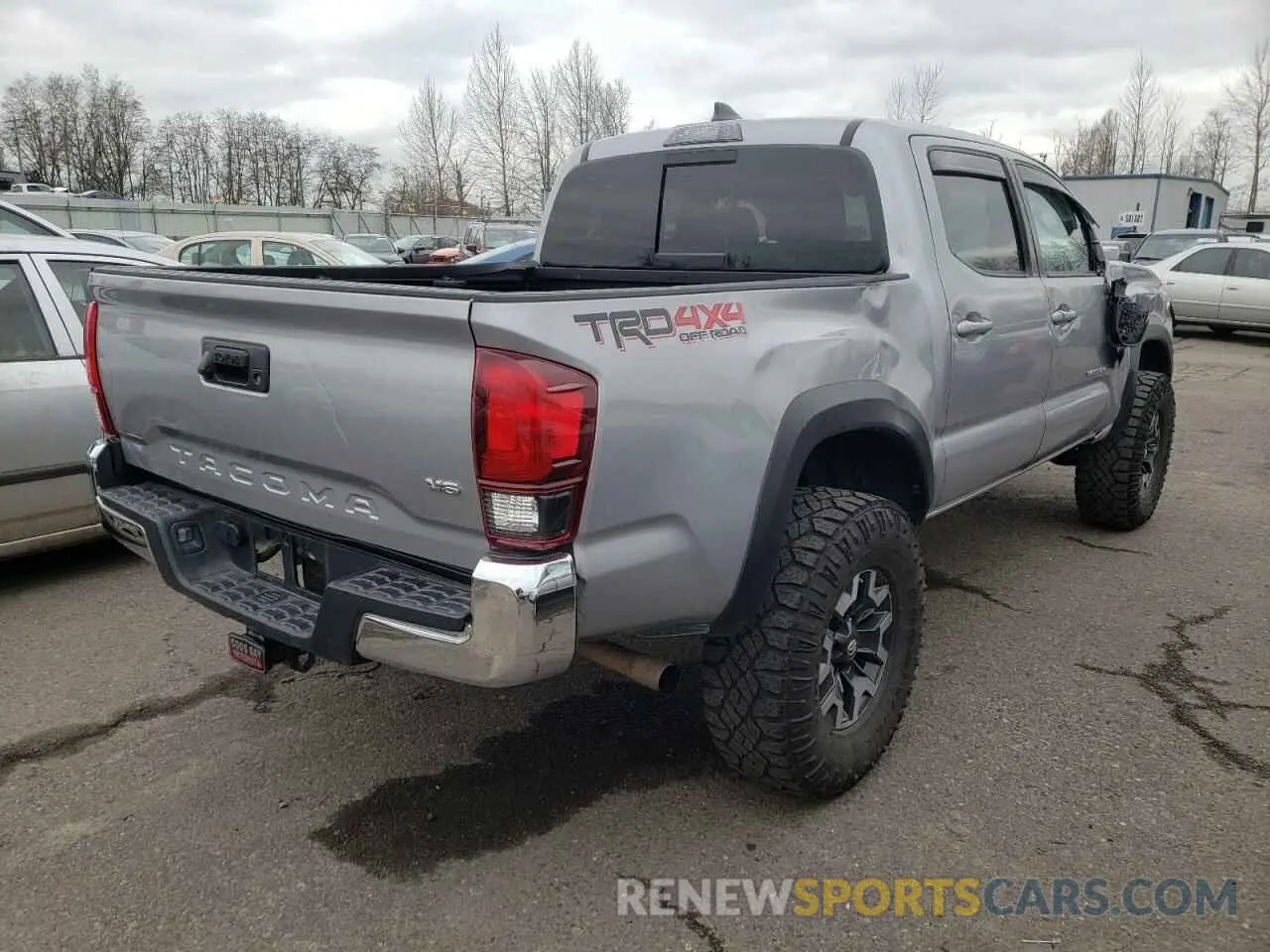 4 Photograph of a damaged car 3TMCZ5AN2KM250544 TOYOTA TACOMA 2019