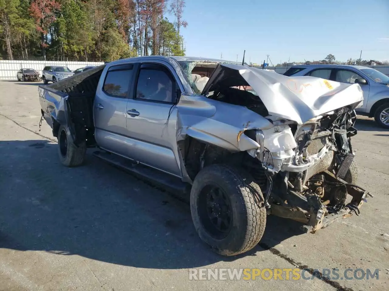 4 Photograph of a damaged car 3TMCZ5AN2KM263066 TOYOTA TACOMA 2019