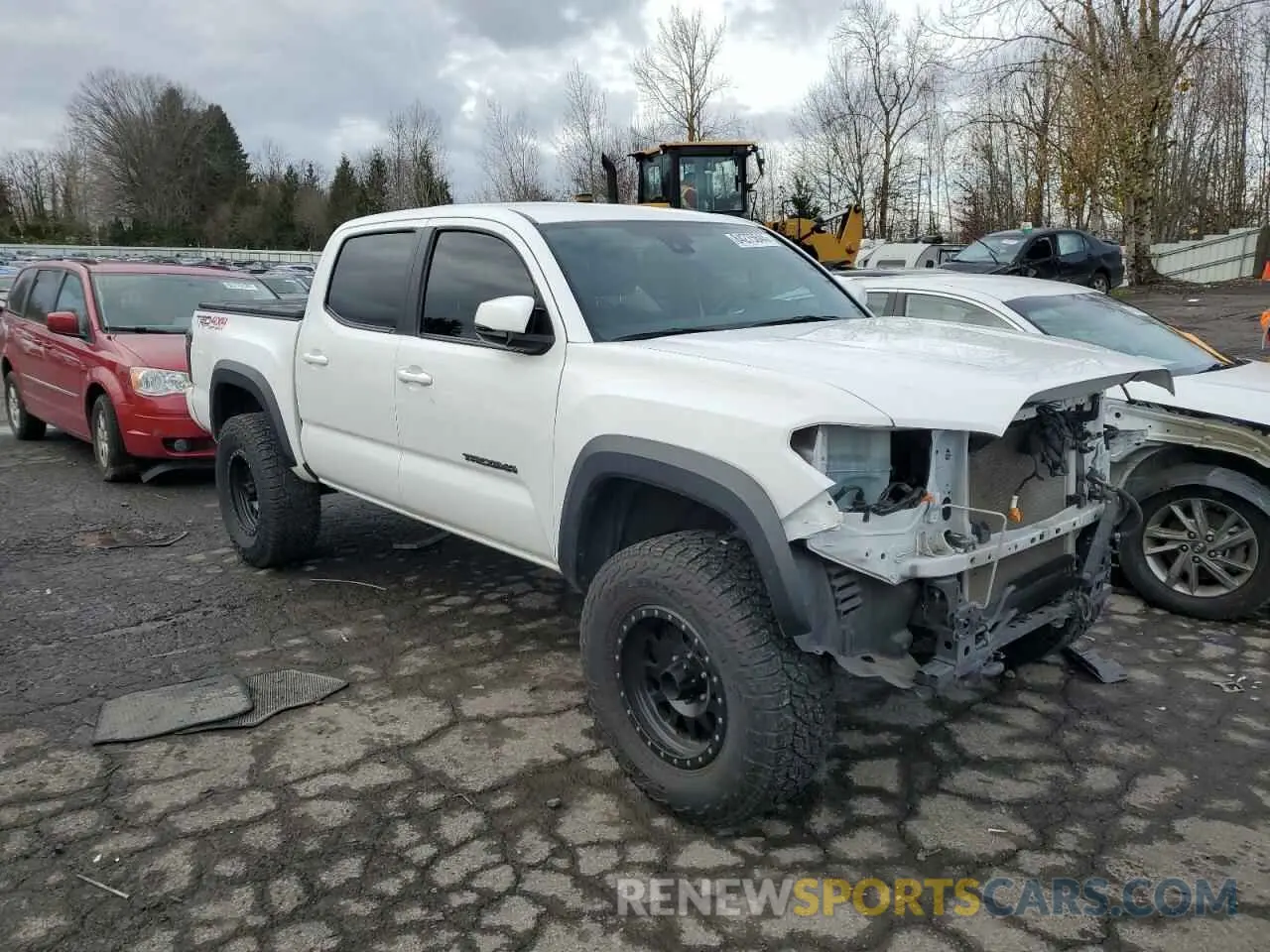 4 Photograph of a damaged car 3TMCZ5AN3KM226267 TOYOTA TACOMA 2019