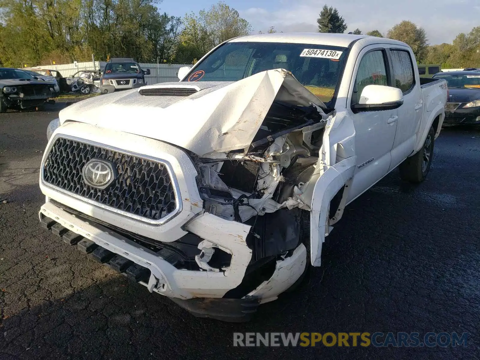 2 Photograph of a damaged car 3TMCZ5AN3KM237401 TOYOTA TACOMA 2019
