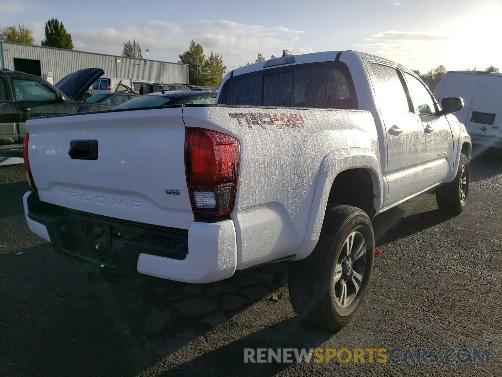 4 Photograph of a damaged car 3TMCZ5AN3KM237401 TOYOTA TACOMA 2019