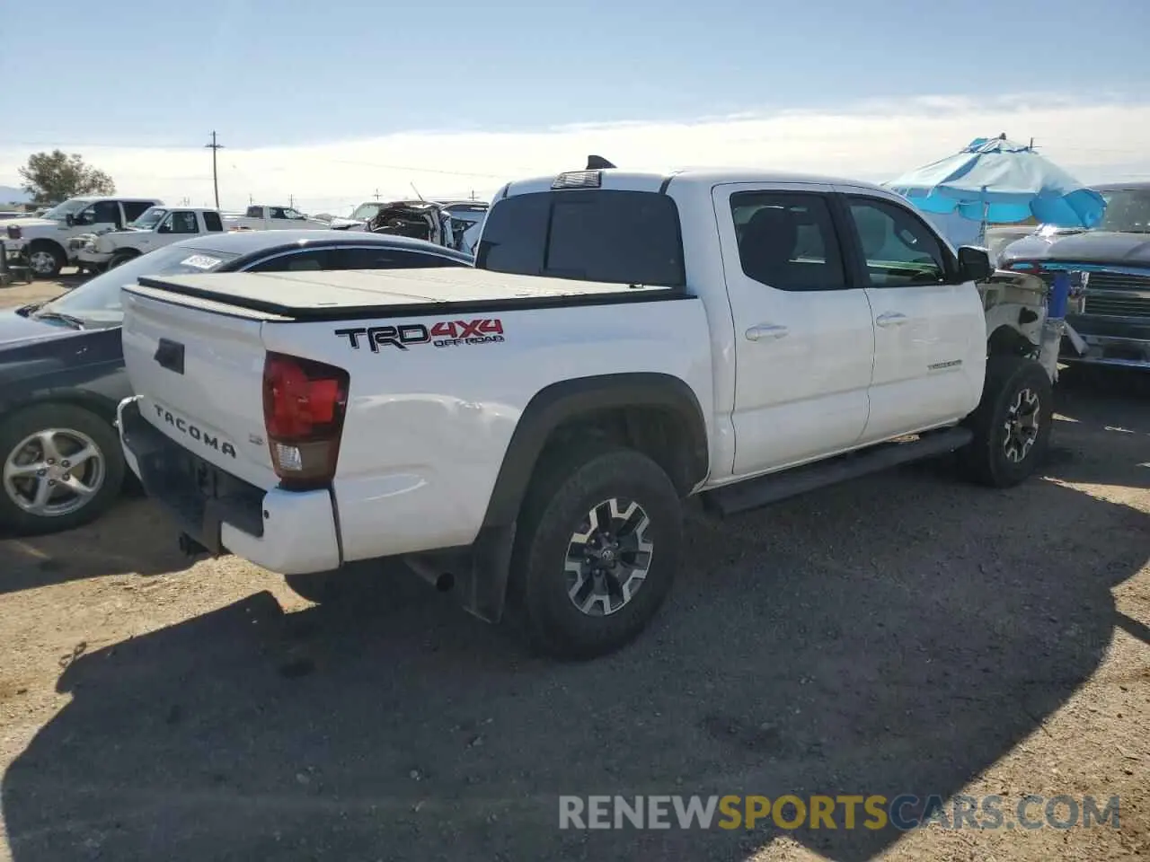 3 Photograph of a damaged car 3TMCZ5AN3KM239973 TOYOTA TACOMA 2019