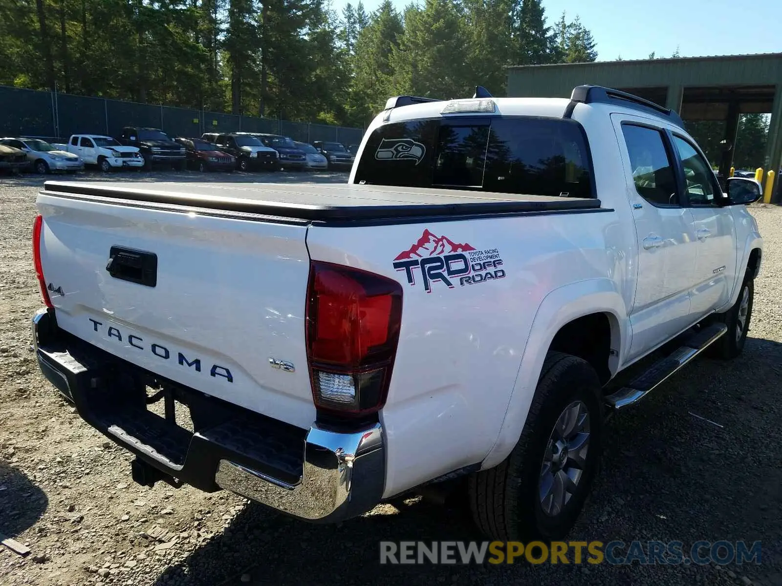 4 Photograph of a damaged car 3TMCZ5AN3KM240525 TOYOTA TACOMA 2019