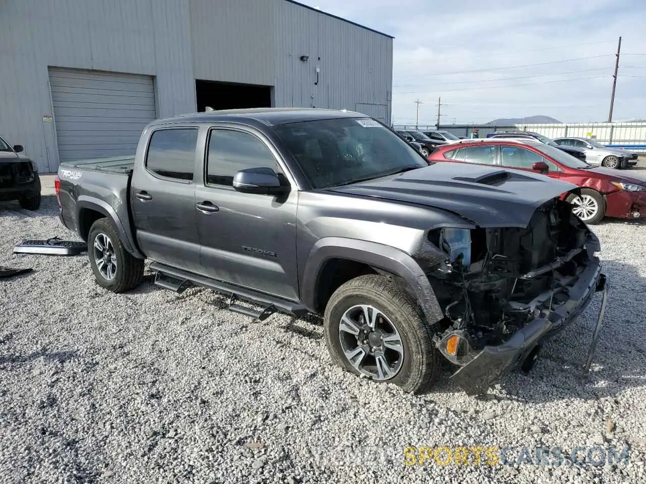 4 Photograph of a damaged car 3TMCZ5AN4KM218131 TOYOTA TACOMA 2019