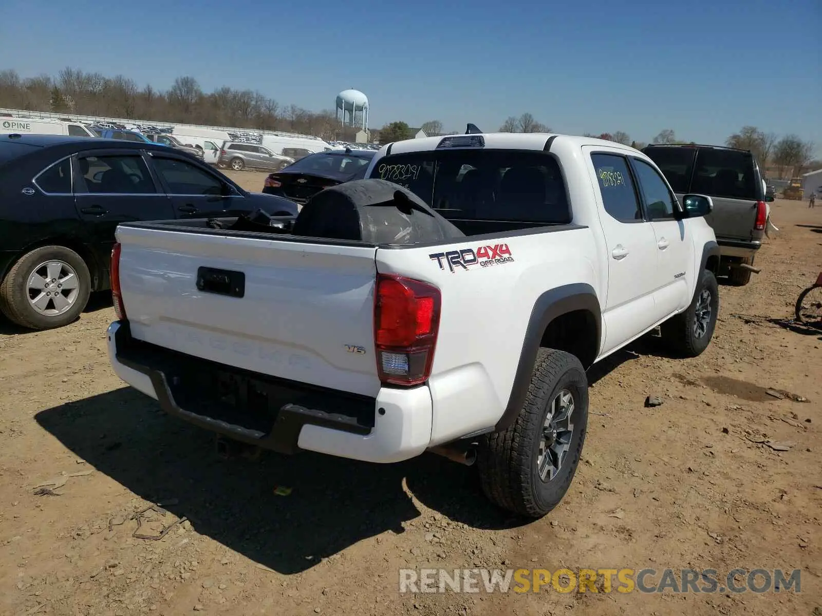 4 Photograph of a damaged car 3TMCZ5AN4KM223085 TOYOTA TACOMA 2019