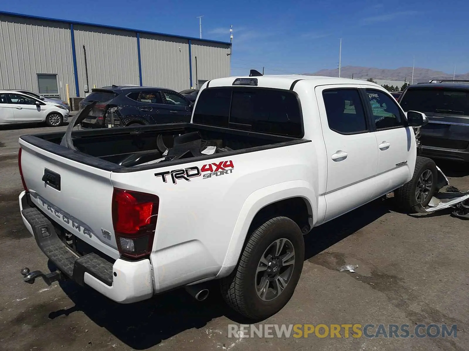 4 Photograph of a damaged car 3TMCZ5AN4KM283352 TOYOTA TACOMA 2019