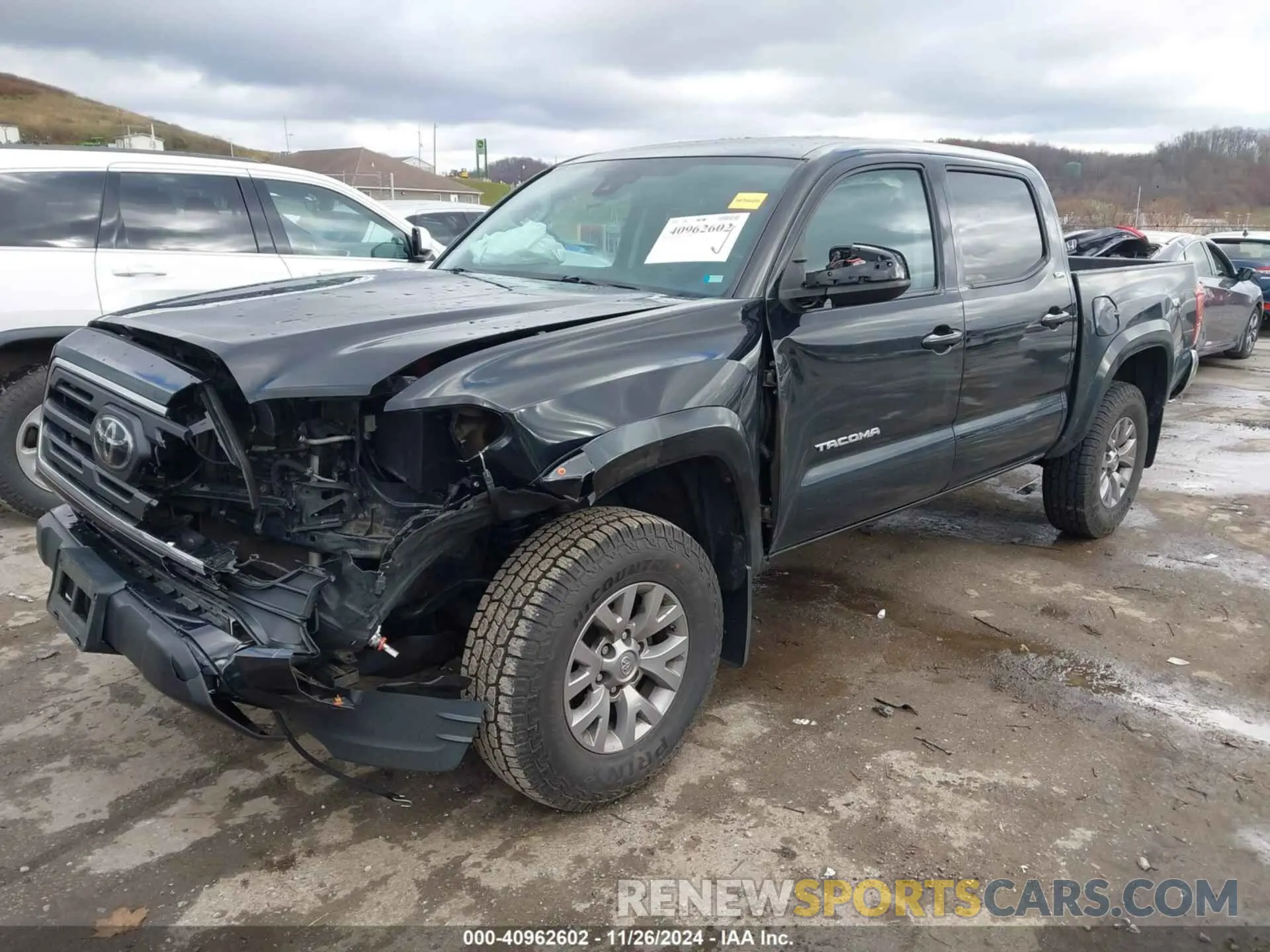 2 Photograph of a damaged car 3TMCZ5AN6KM203517 TOYOTA TACOMA 2019