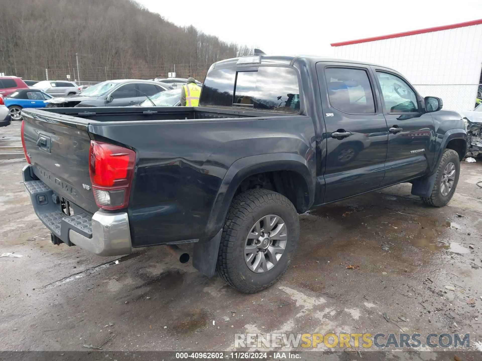 4 Photograph of a damaged car 3TMCZ5AN6KM203517 TOYOTA TACOMA 2019