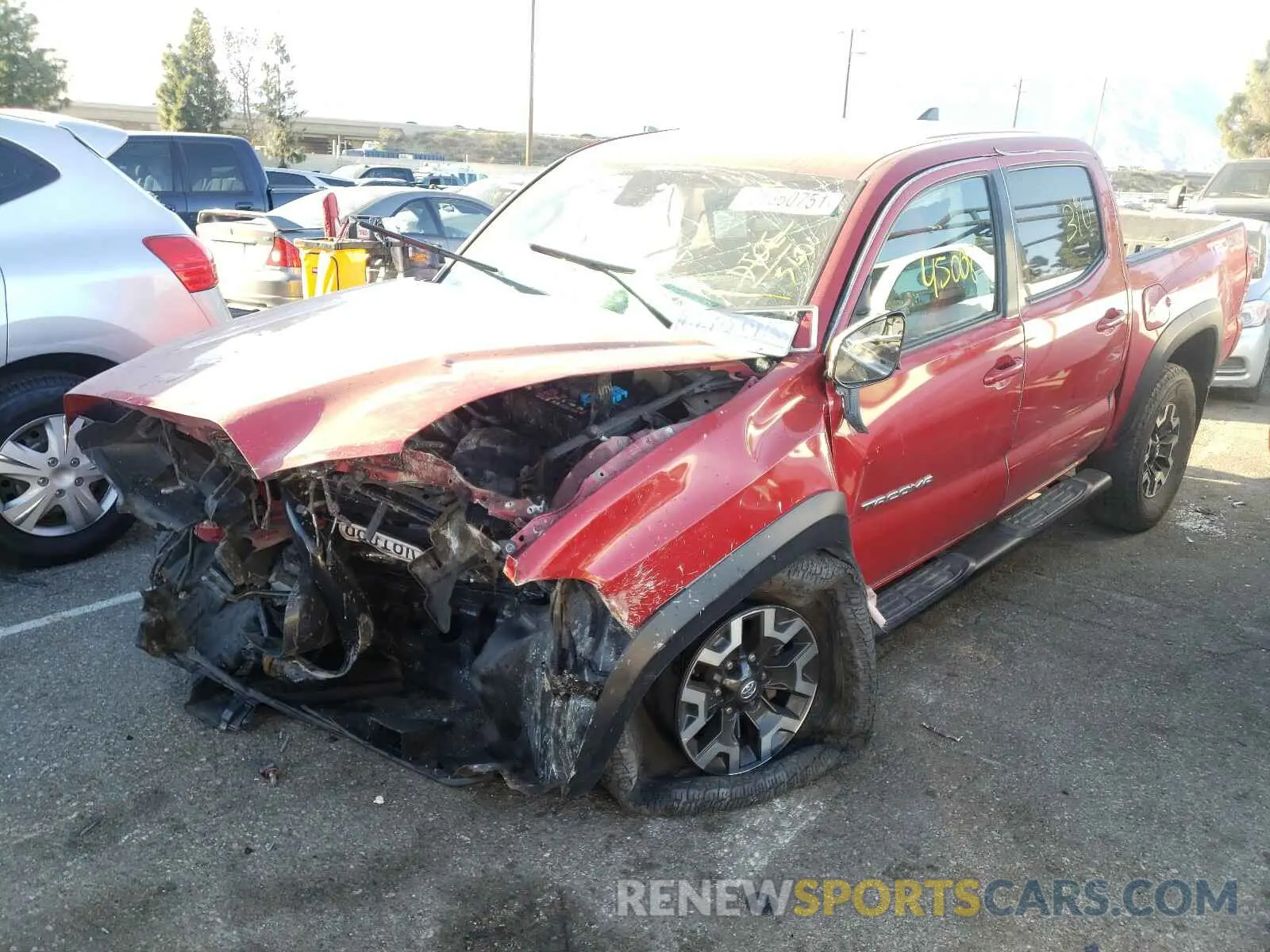 2 Photograph of a damaged car 3TMCZ5AN7KM194617 TOYOTA TACOMA 2019