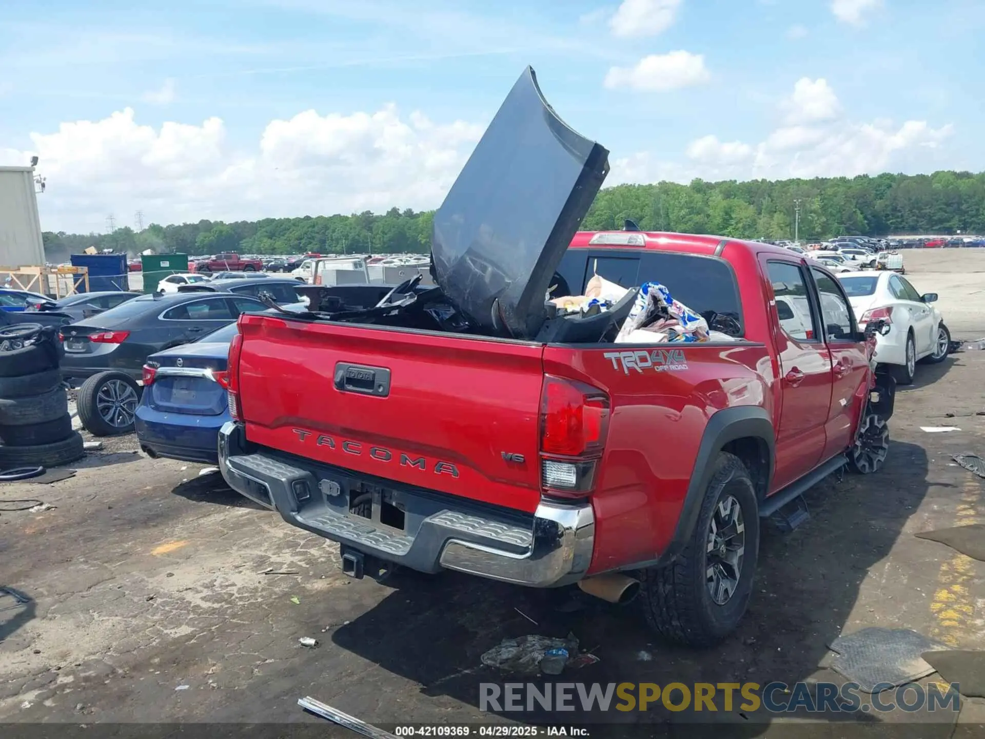 4 Photograph of a damaged car 3TMCZ5AN8KM198613 TOYOTA TACOMA 2019