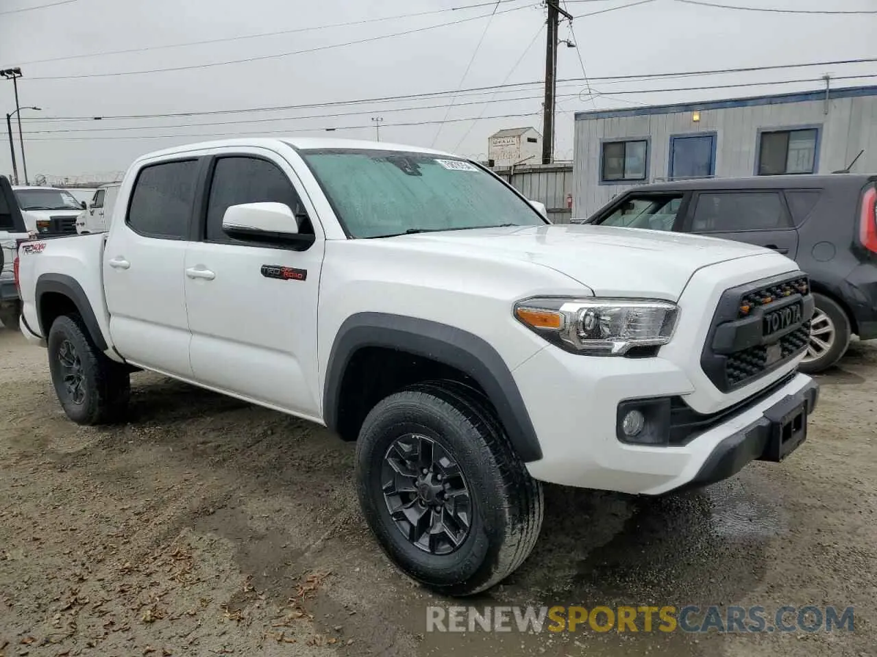 4 Photograph of a damaged car 3TMCZ5AN8KM217077 TOYOTA TACOMA 2019