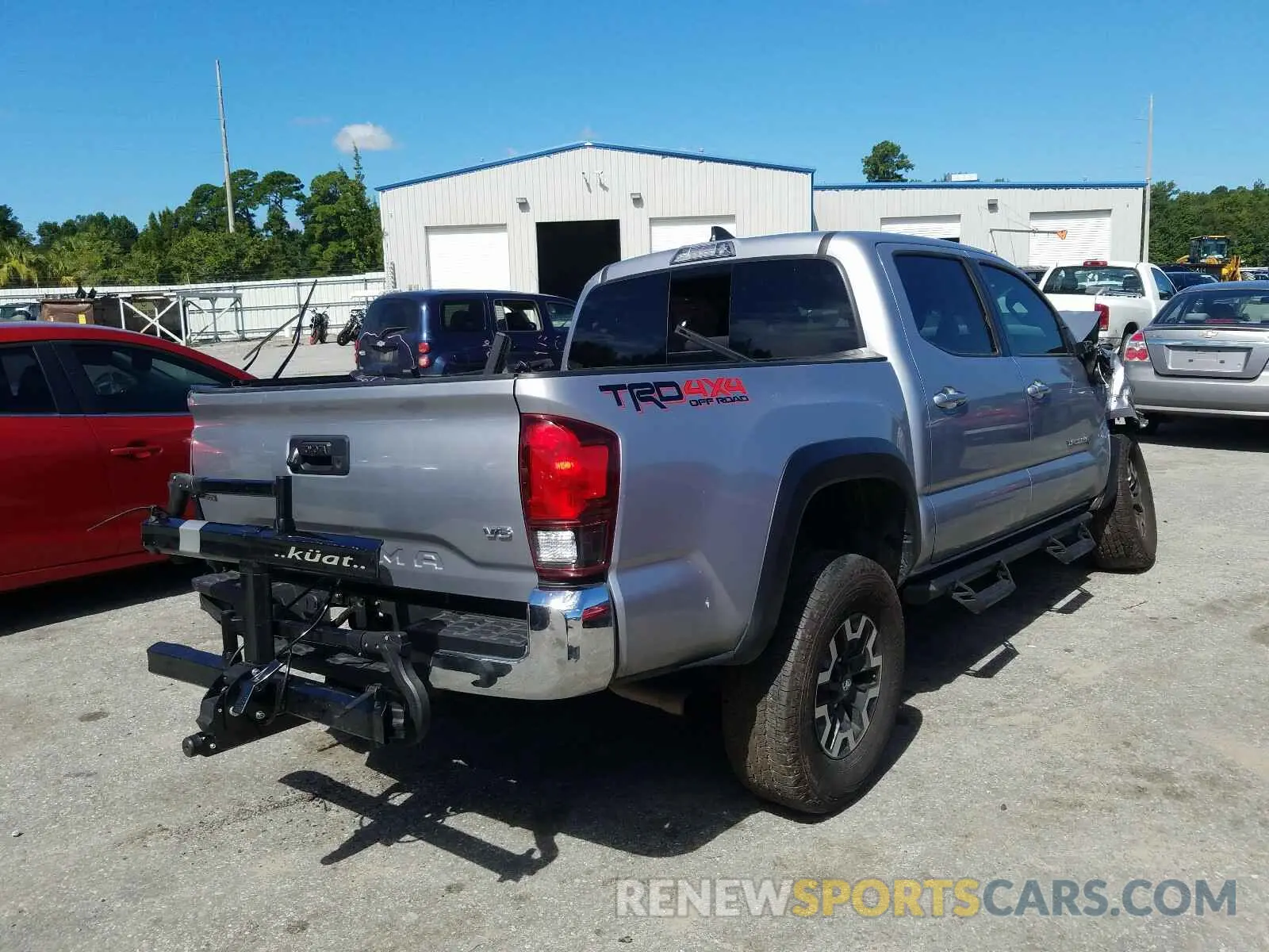 4 Photograph of a damaged car 3TMCZ5AN8KM225499 TOYOTA TACOMA 2019