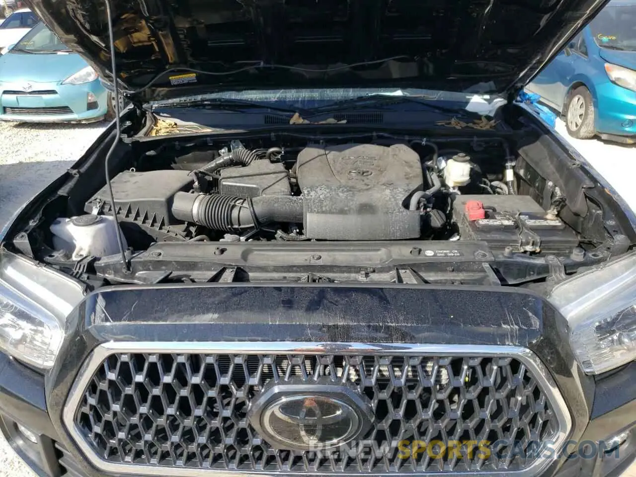 7 Photograph of a damaged car 3TMCZ5AN9KM260326 TOYOTA TACOMA 2019