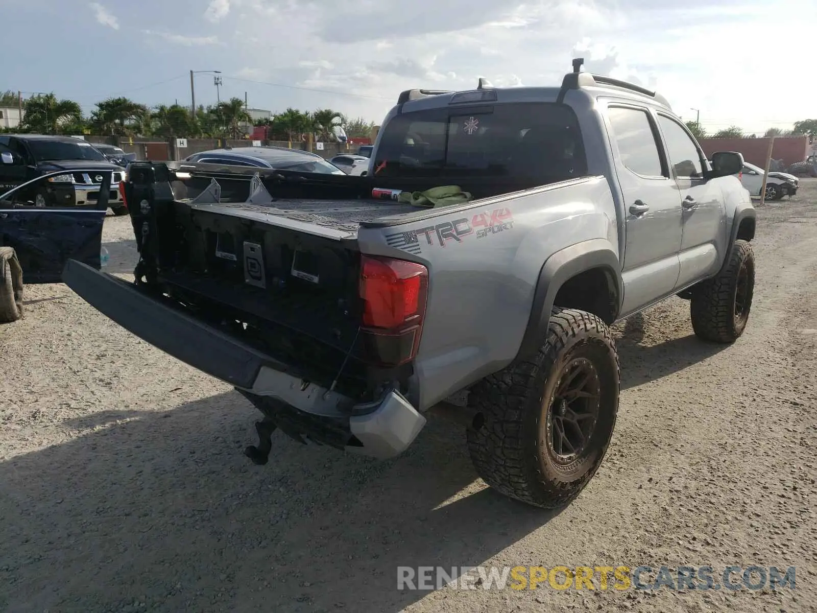 4 Photograph of a damaged car 3TMCZ5ANXKM231756 TOYOTA TACOMA 2019