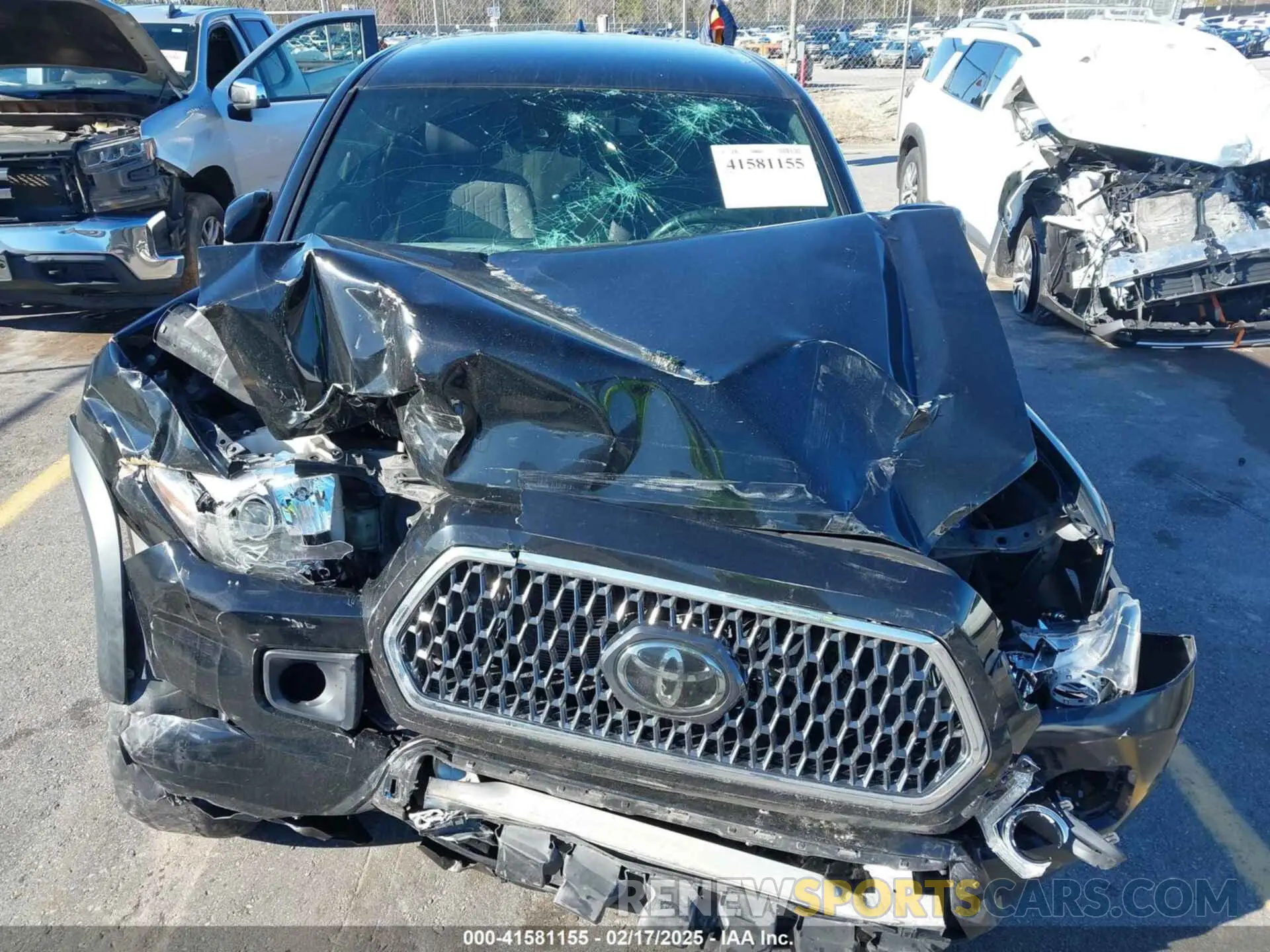 6 Photograph of a damaged car 3TMCZ5ANXKM267043 TOYOTA TACOMA 2019