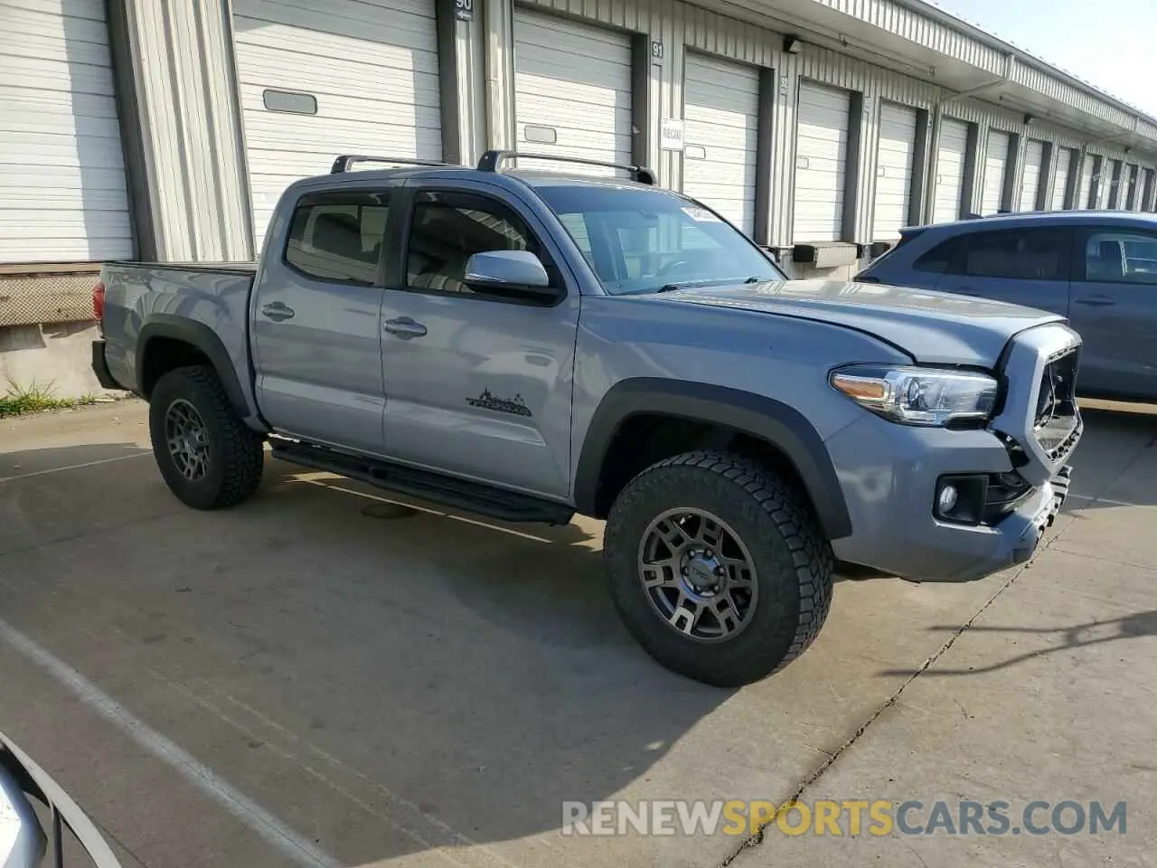 4 Photograph of a damaged car 3TMCZ5ANXKM275837 TOYOTA TACOMA 2019