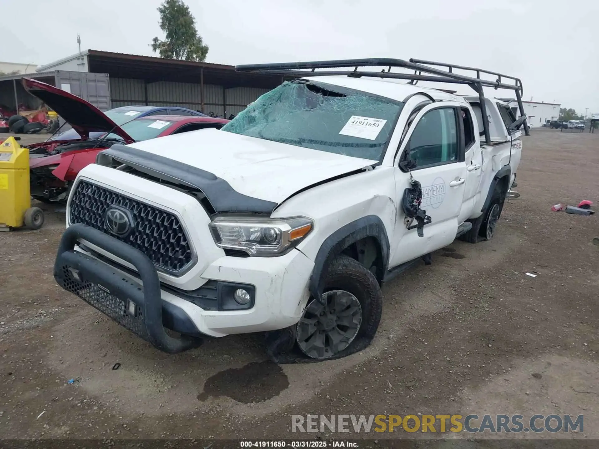 2 Photograph of a damaged car 3TMDZ5BN0KM069526 TOYOTA TACOMA 2019