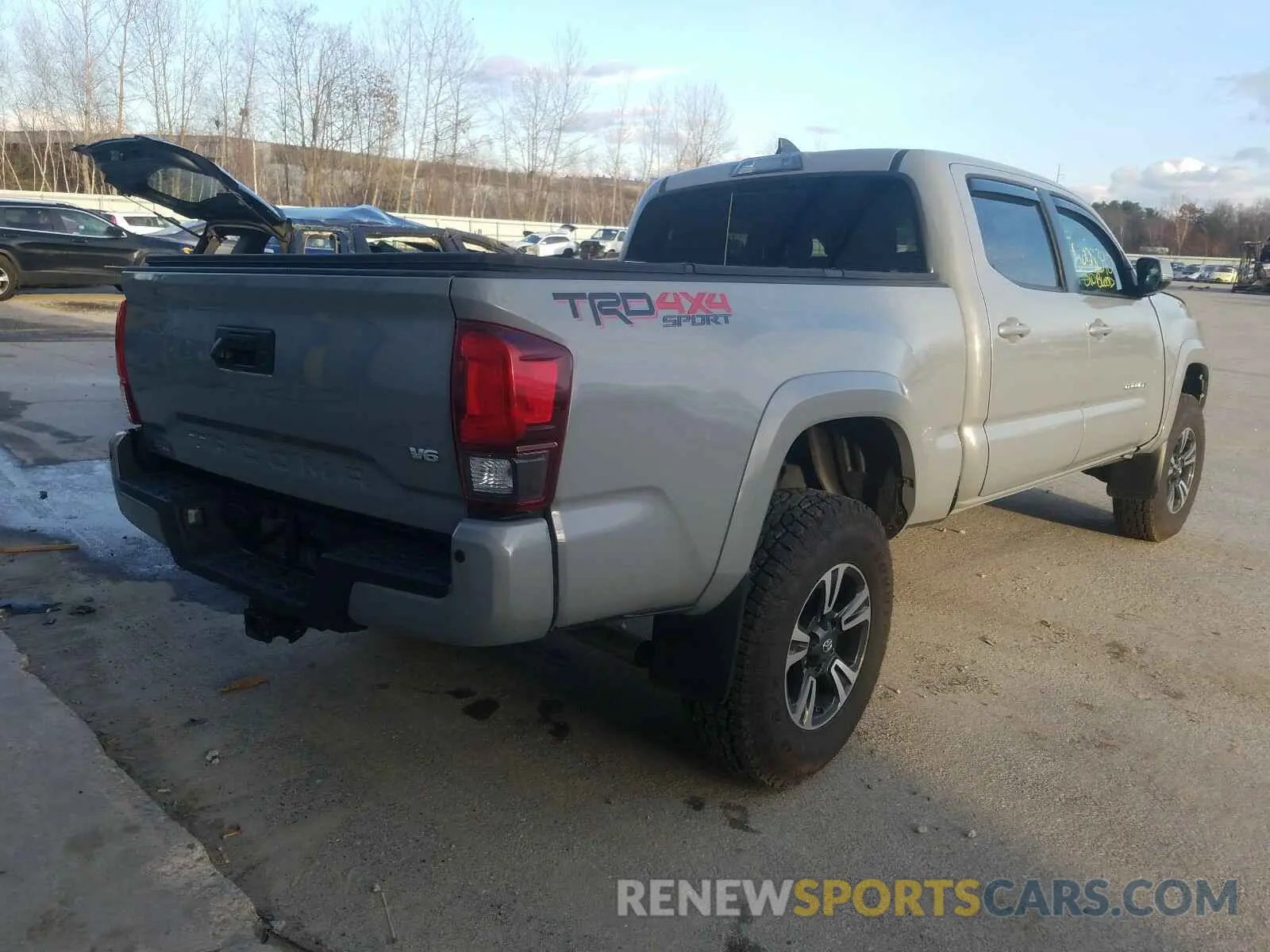 4 Photograph of a damaged car 3TMDZ5BN2KM077501 TOYOTA TACOMA 2019
