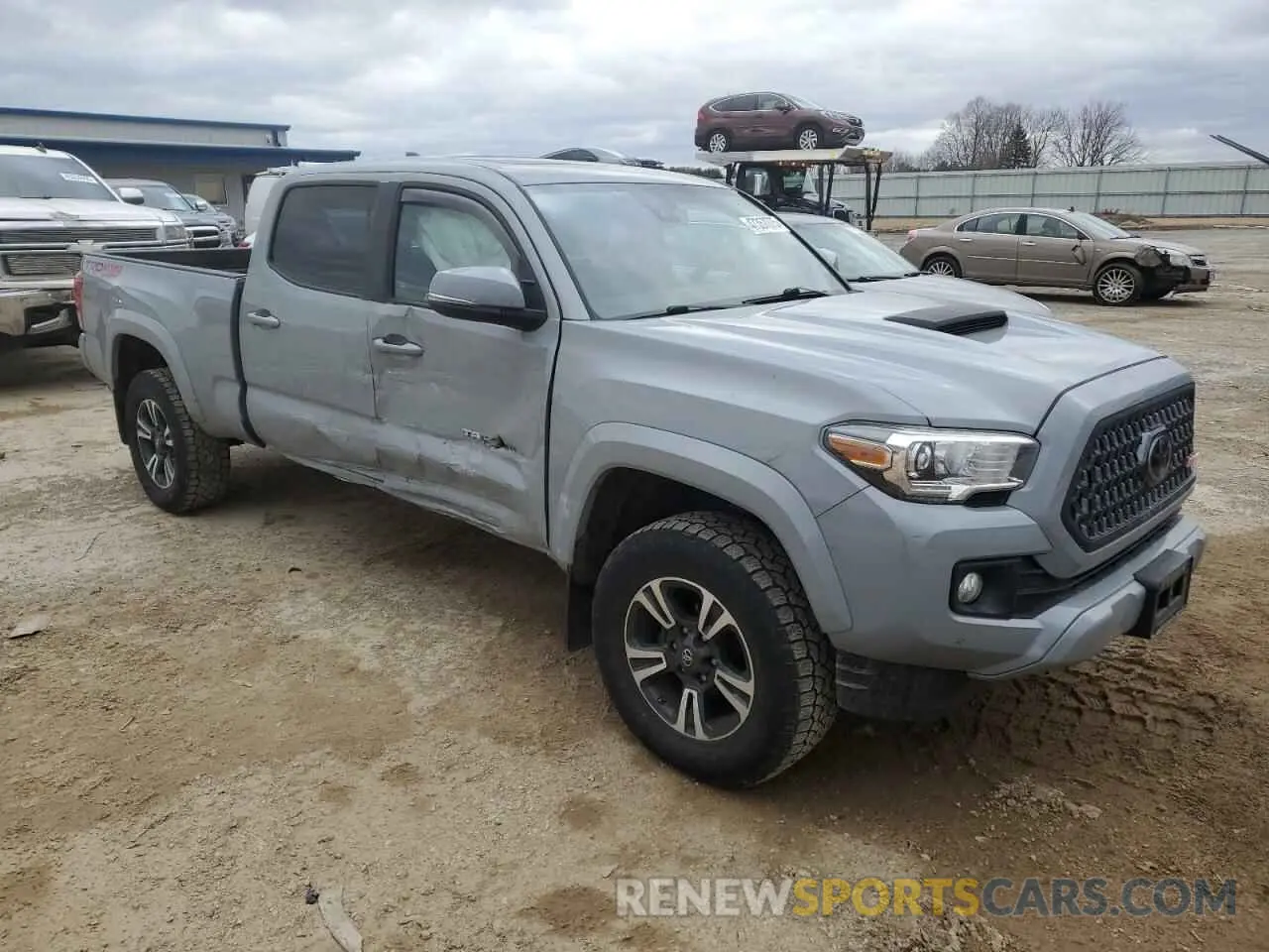 4 Photograph of a damaged car 3TMDZ5BN5KM058358 TOYOTA TACOMA 2019