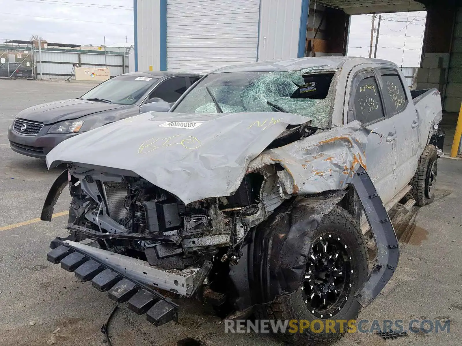 2 Photograph of a damaged car 3TMDZ5BN5KM065679 TOYOTA TACOMA 2019