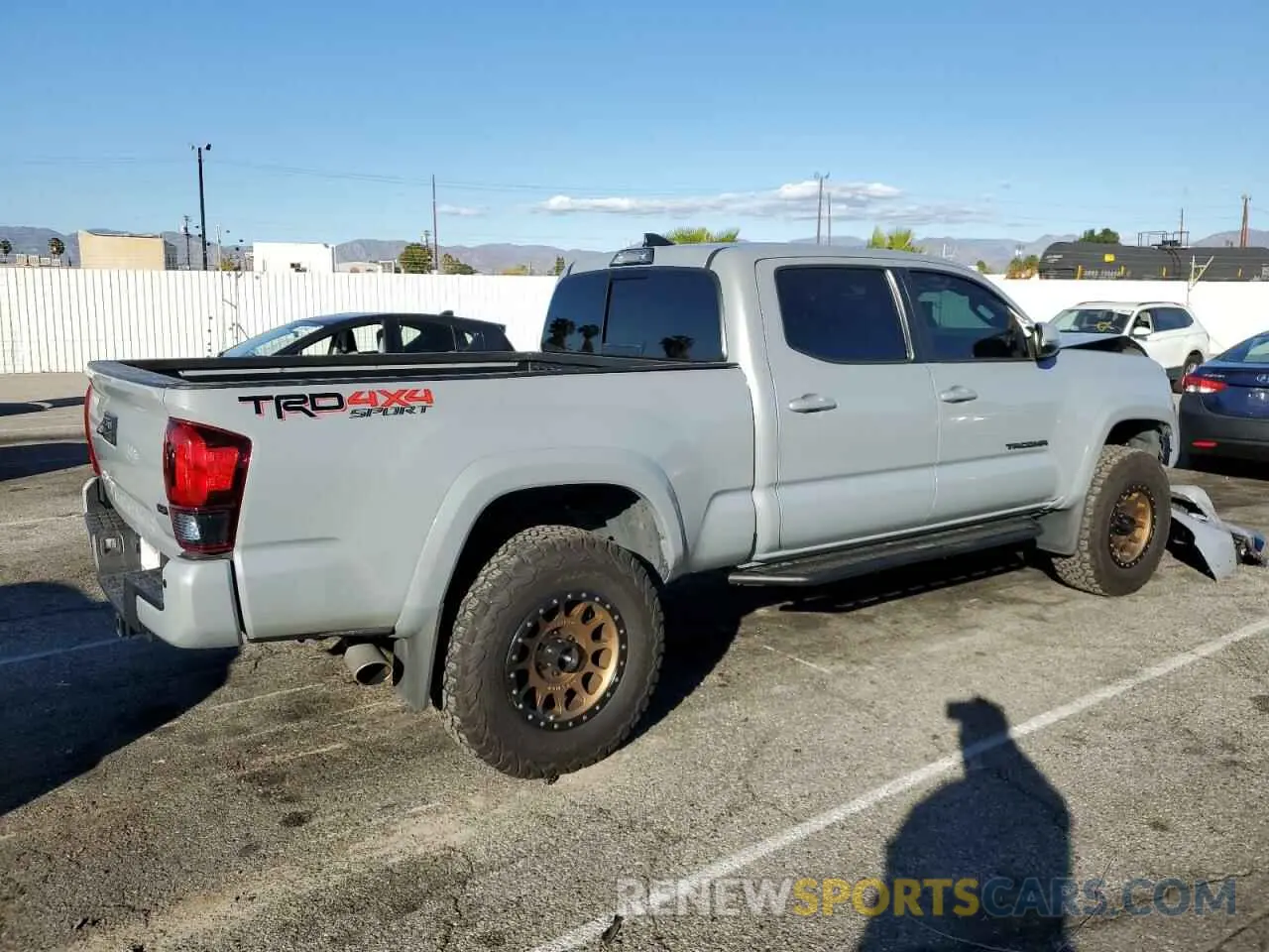 4 Photograph of a damaged car 3TMDZ5BNXKM057660 TOYOTA TACOMA 2019