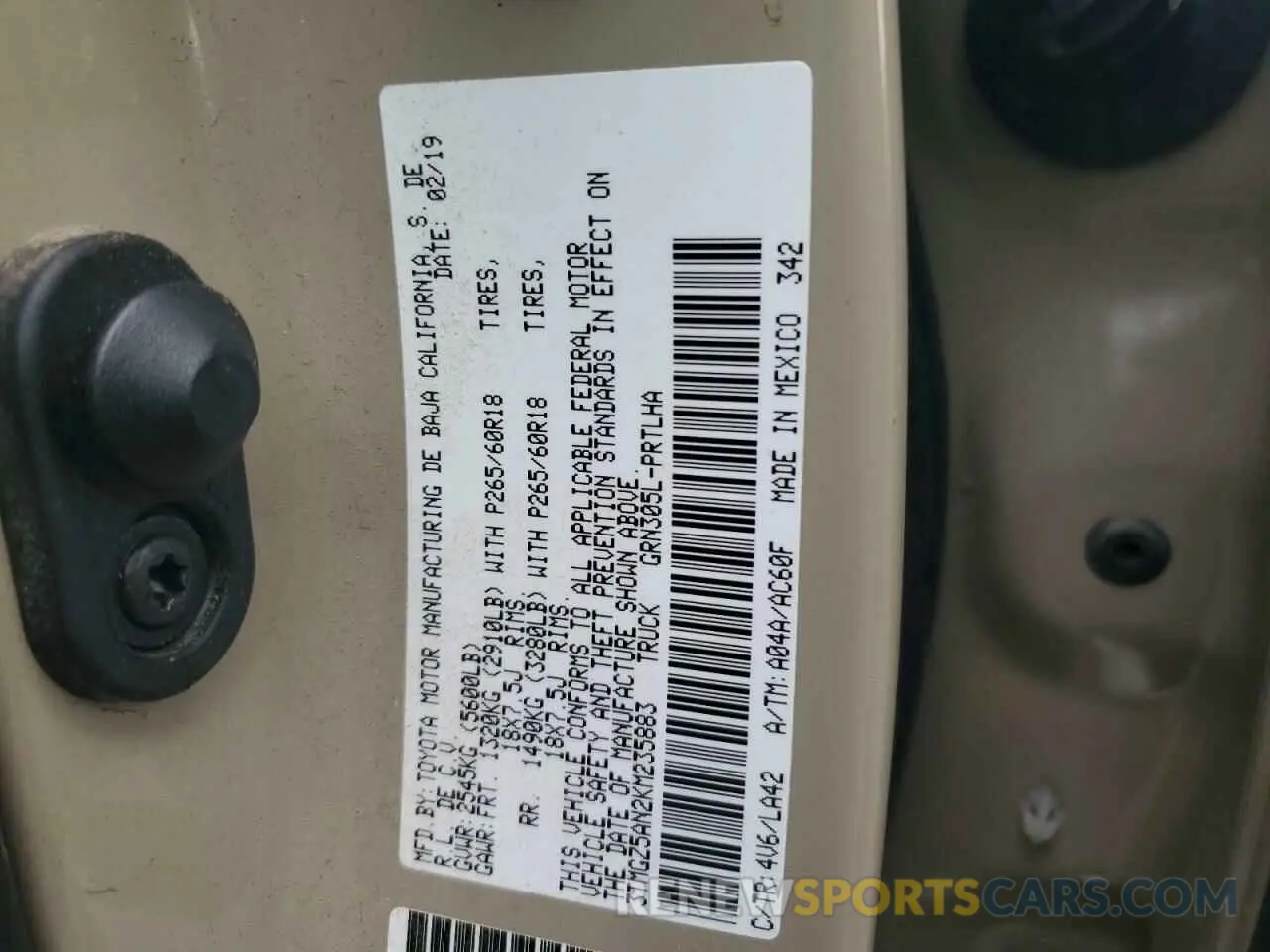 12 Photograph of a damaged car 3TMGZ5AN2KM235883 TOYOTA TACOMA 2019